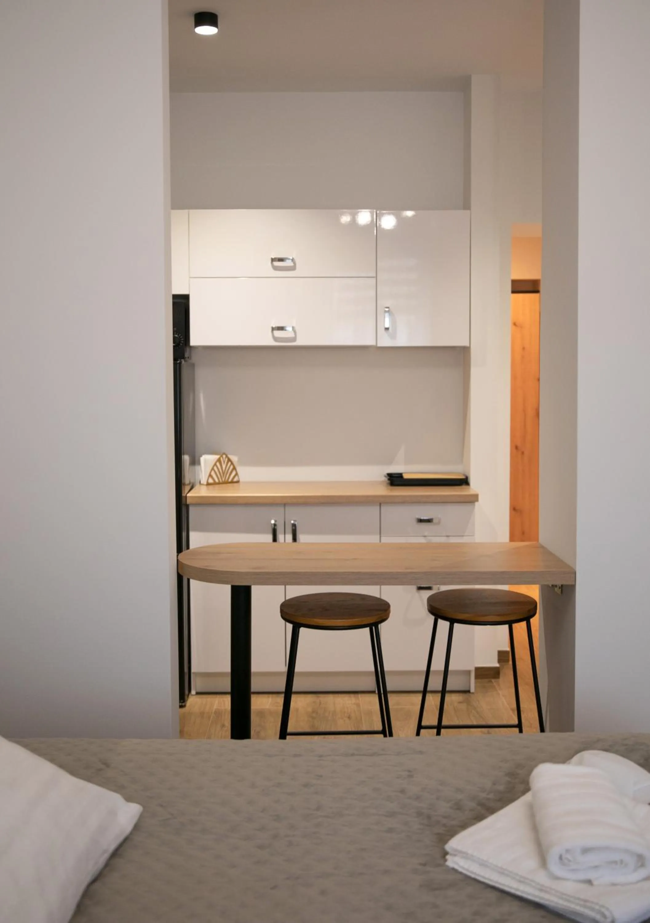 Kitchen or kitchenette, Bed in Hotel Piast