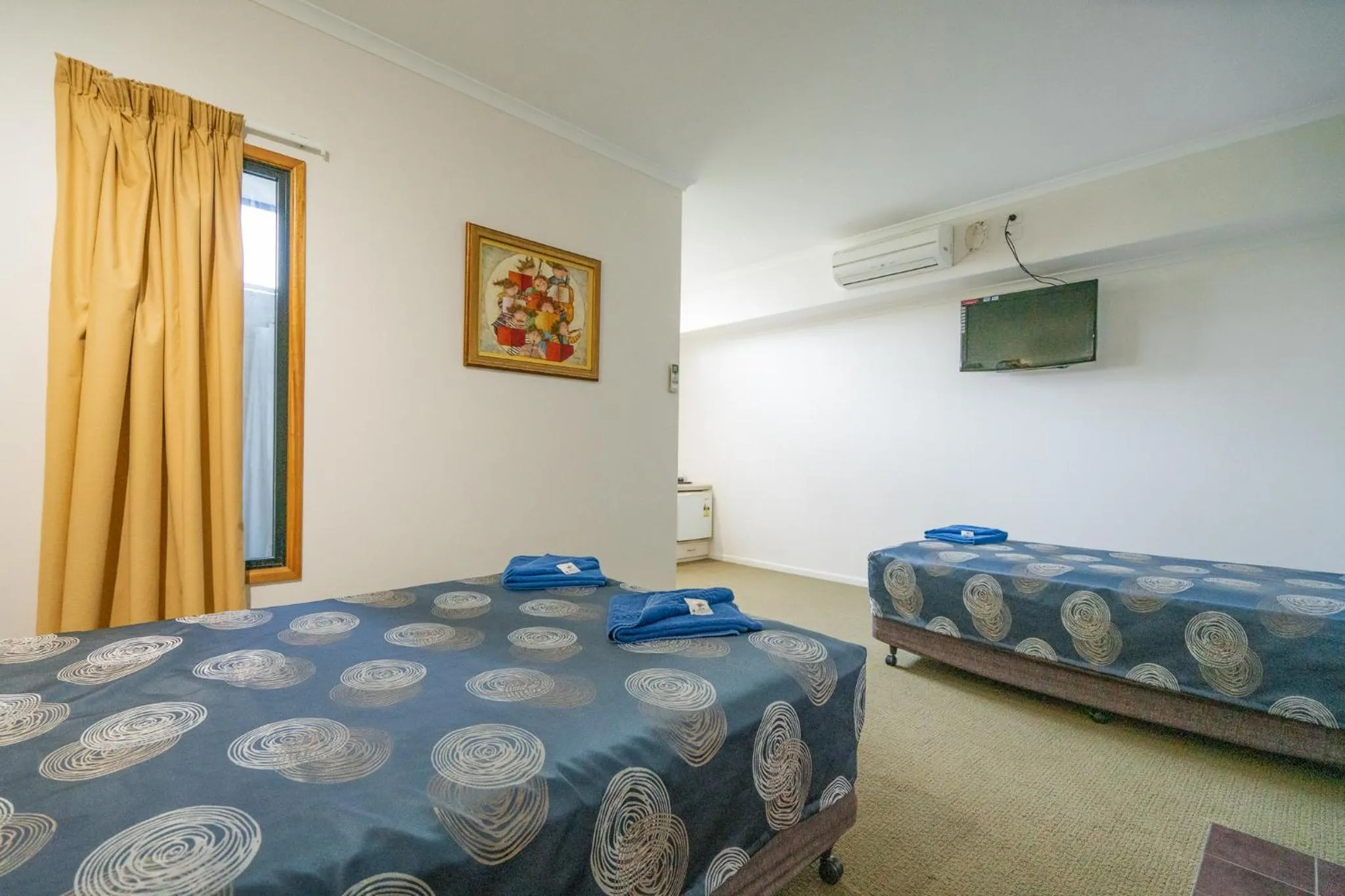 Bed in Capella Hotel Motel