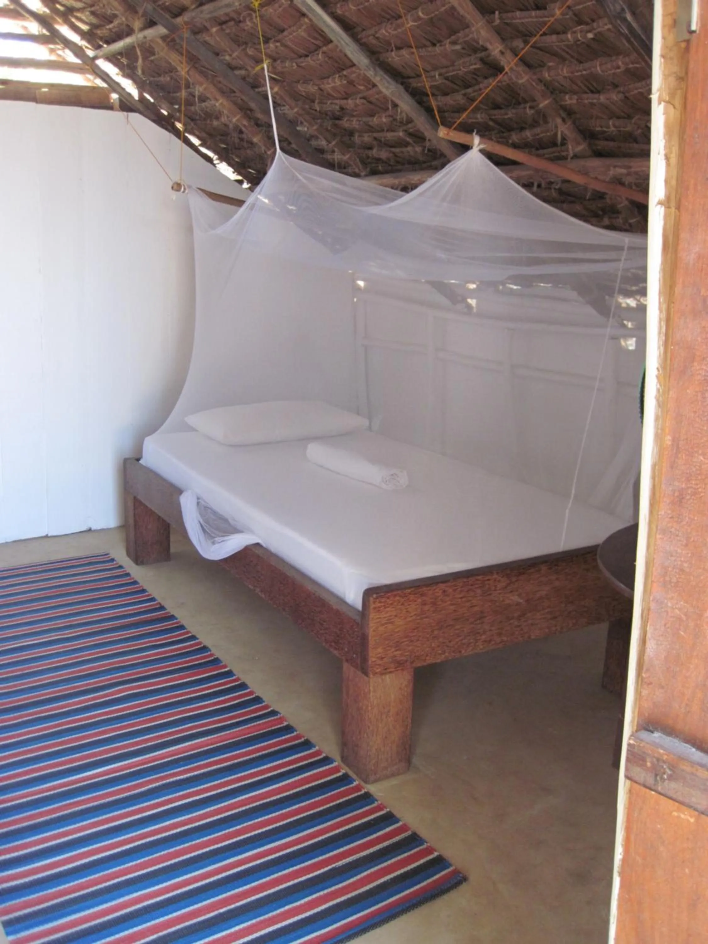 Bed in Kipepeo Beach and Village