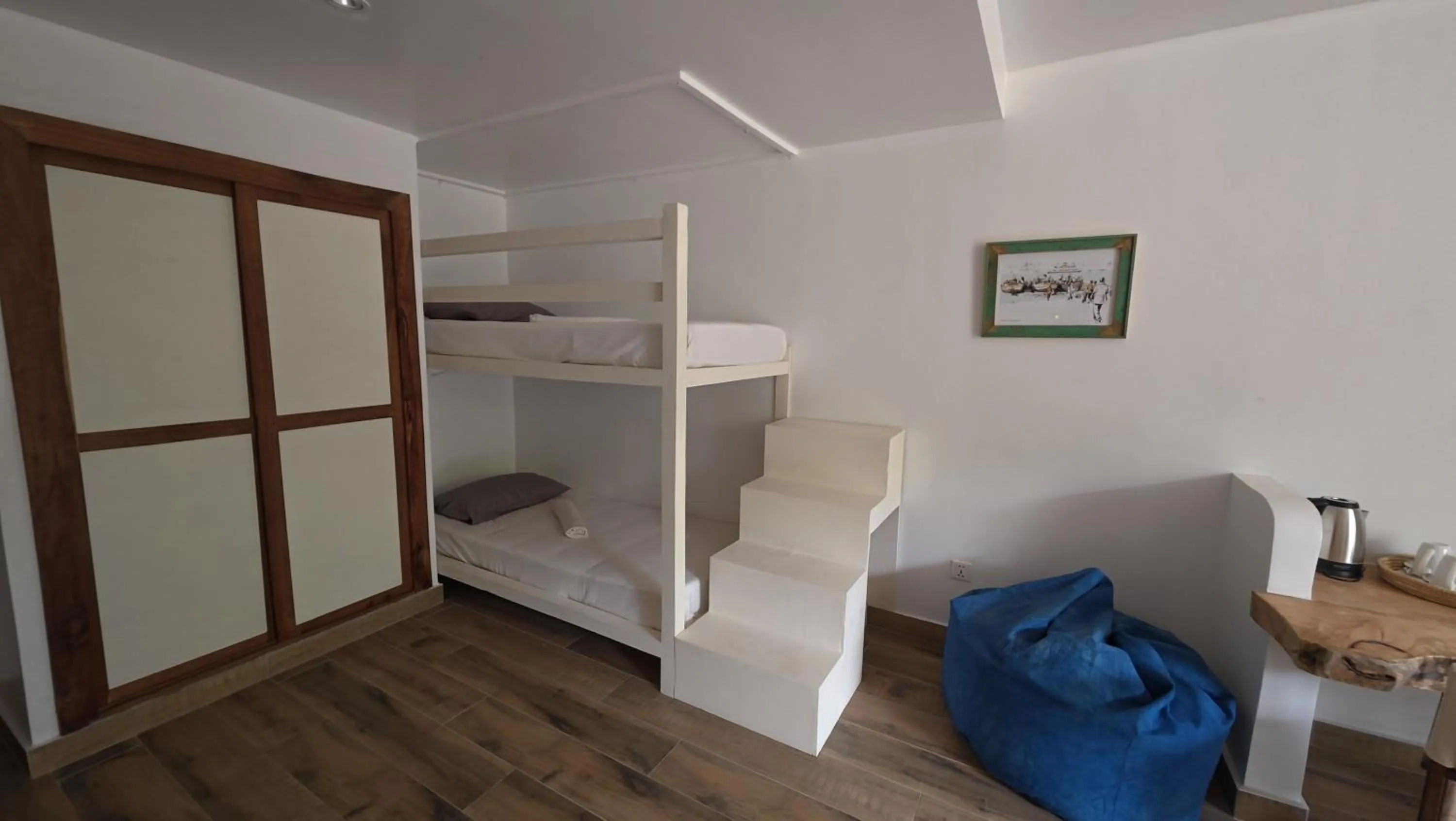 wardrobe, Bed in Kipepeo Beach and Village