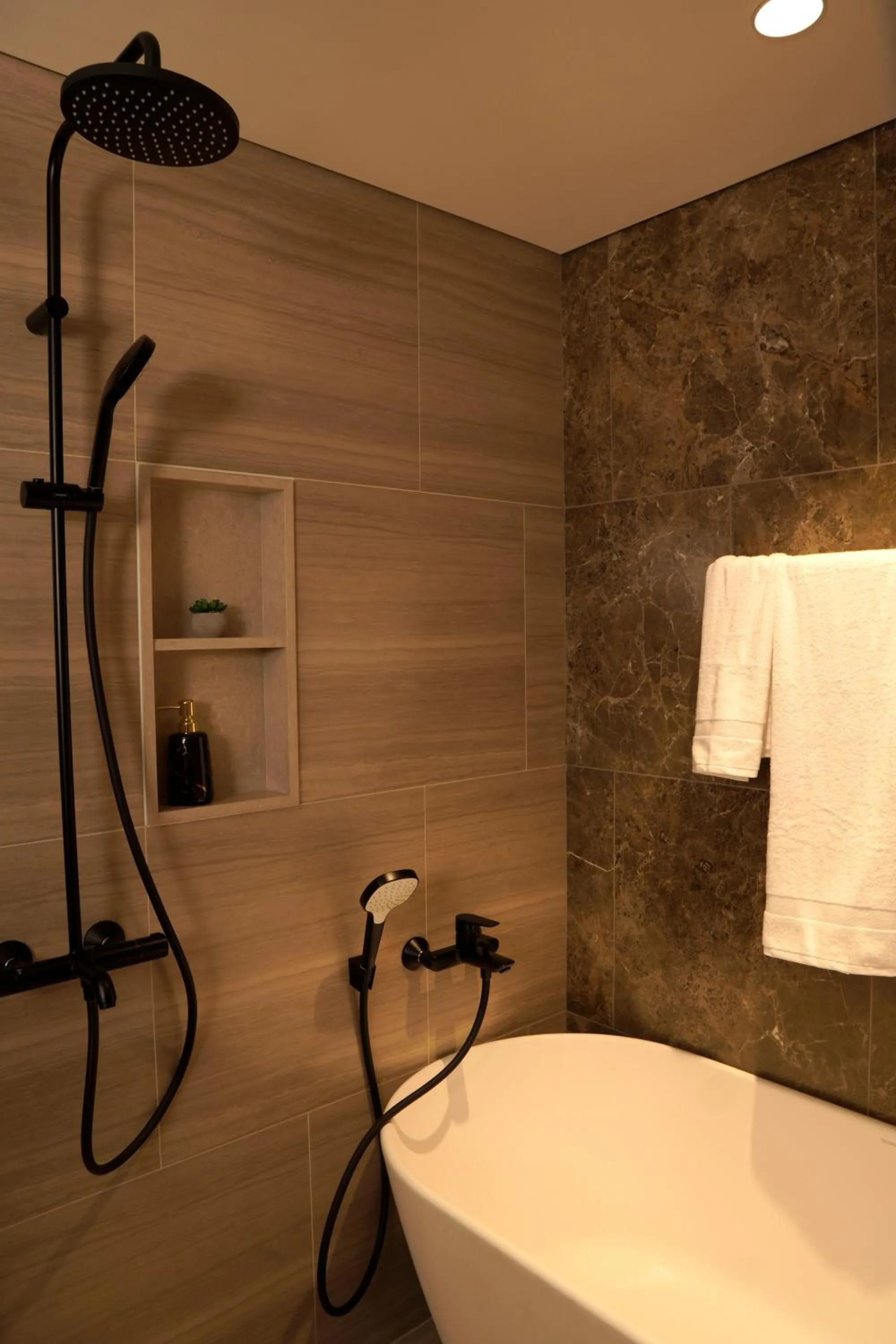 Shower in Lancaster Legacy Hotel & Apartments