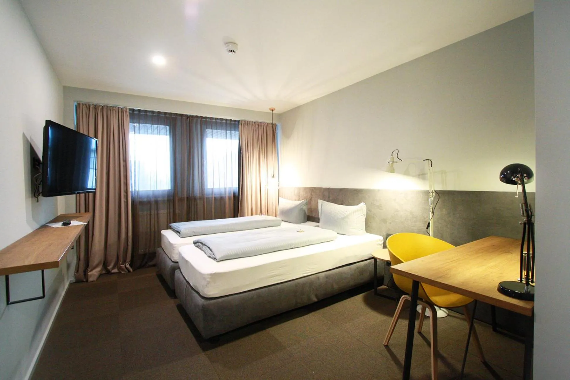 Photo of the whole room, Bed in ARRIVEL Hotel Kirchheim - bisher Novitel