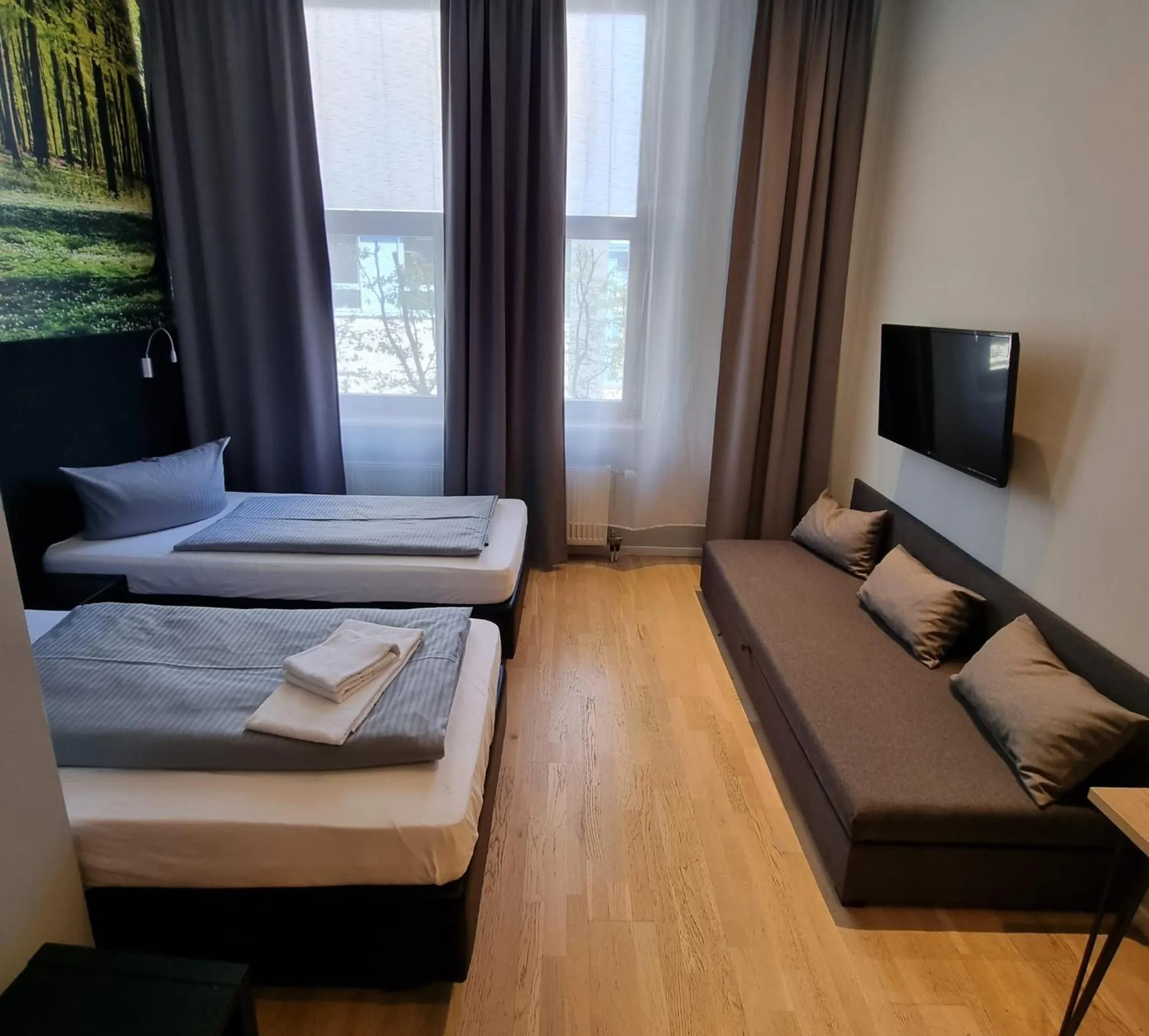 Photo of the whole room, Bed in ARRIVEL Hotel Kirchheim - bisher Novitel