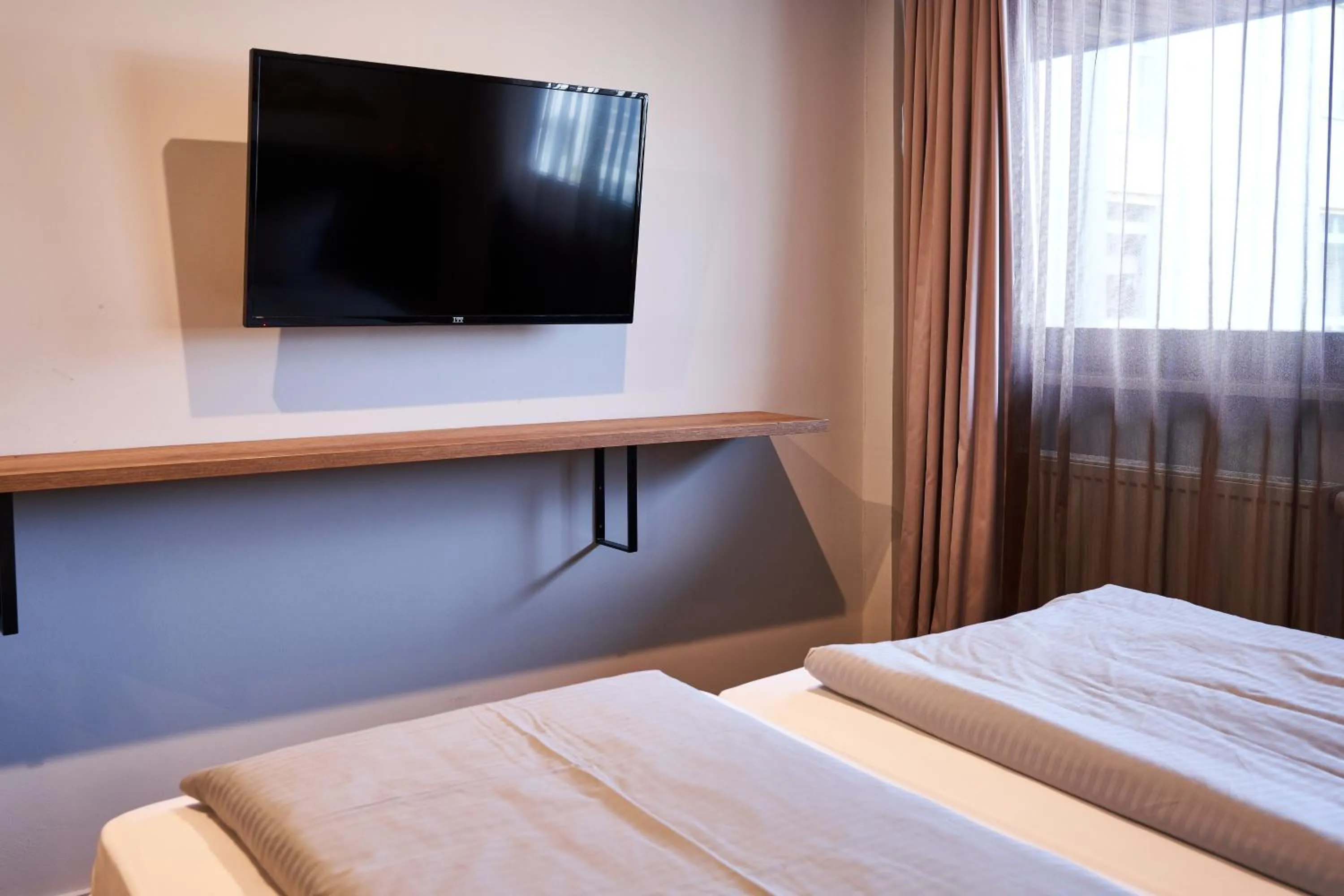 Photo of the whole room, Bed in ARRIVEL Hotel Kirchheim - bisher Novitel