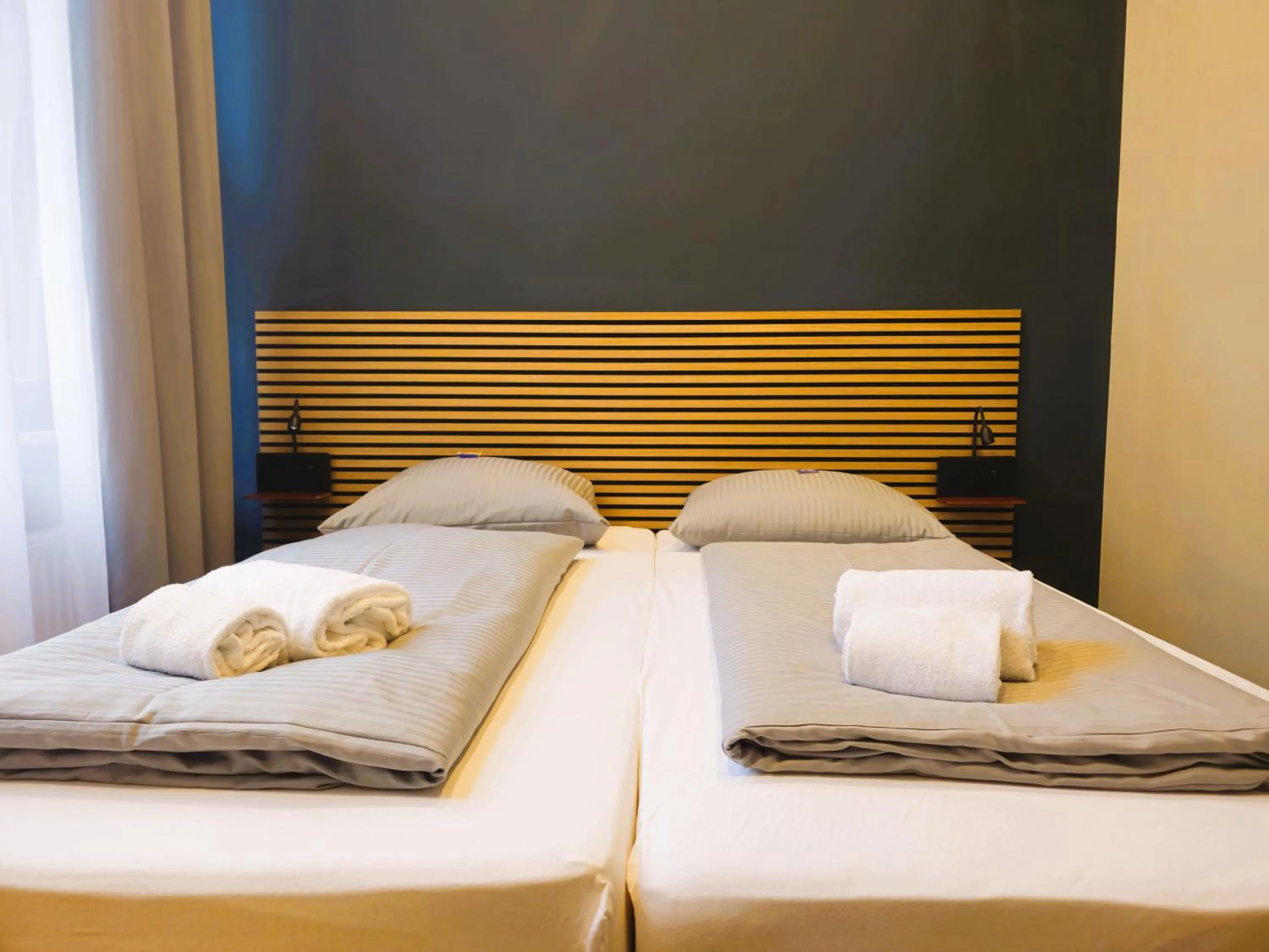 Photo of the whole room, Bed in ARRIVEL Hotel Kirchheim - bisher Novitel