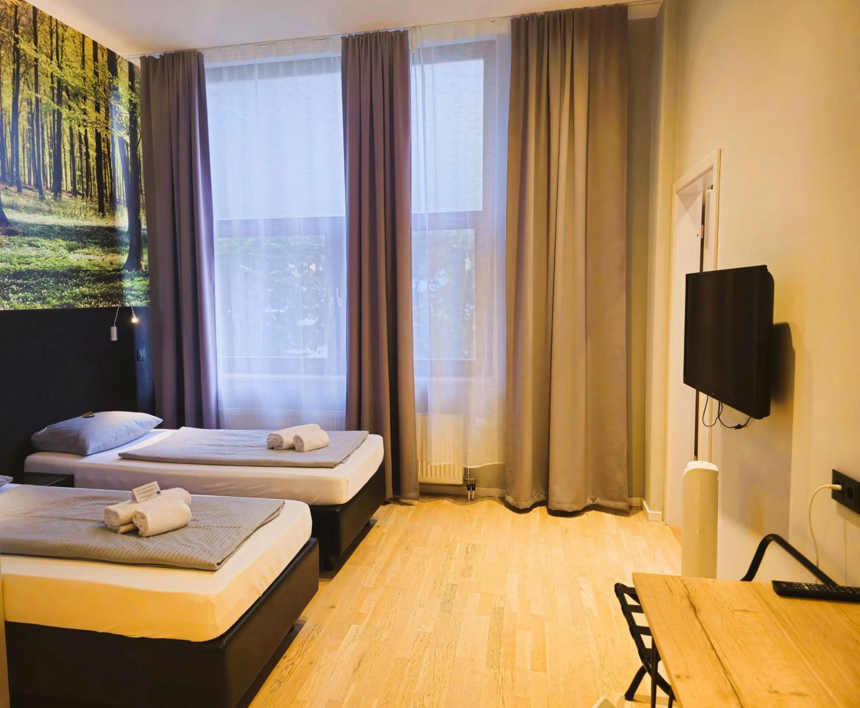 Photo of the whole room, Bed in ARRIVEL Hotel Kirchheim - bisher Novitel