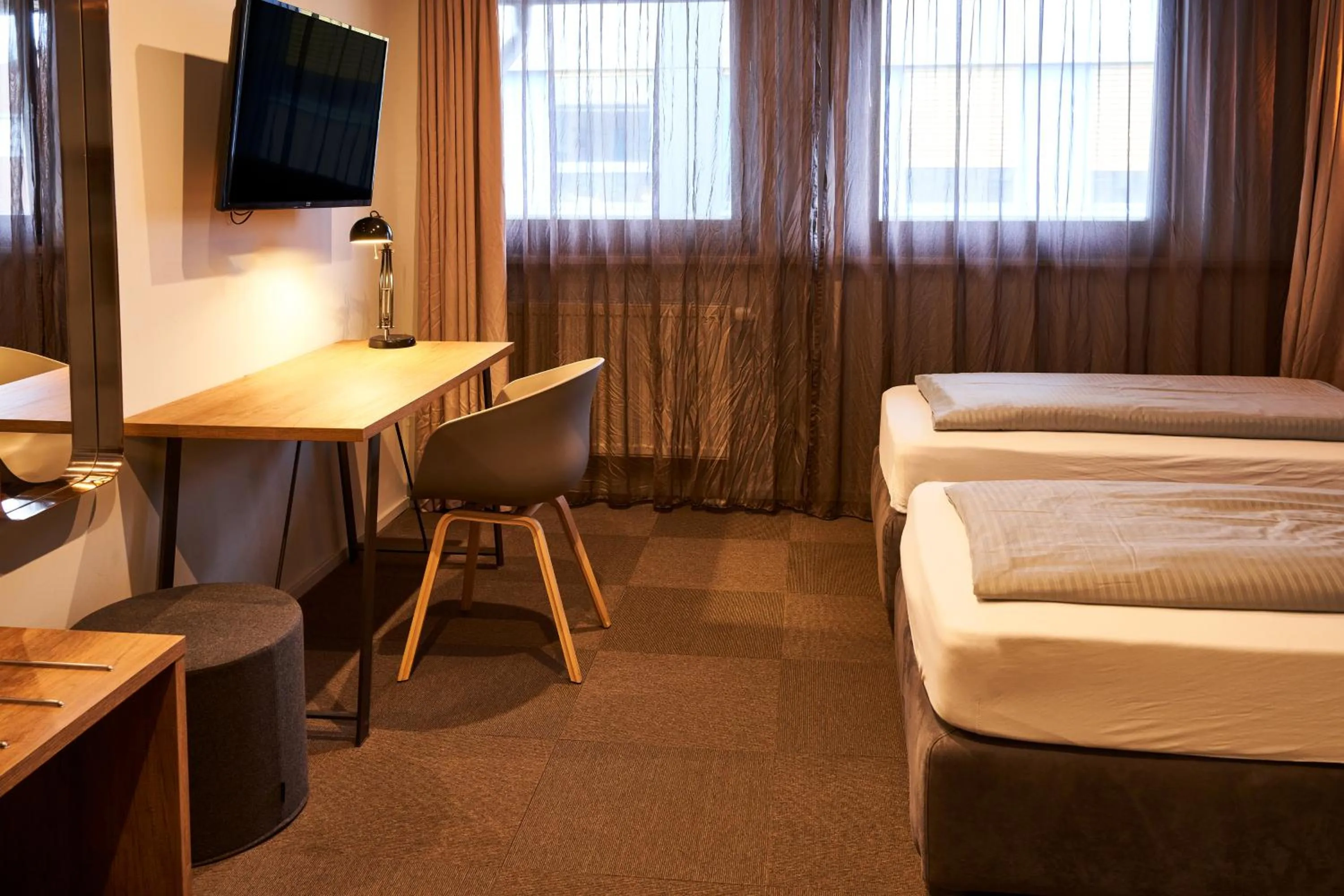Photo of the whole room, Bed in ARRIVEL Hotel Kirchheim - bisher Novitel