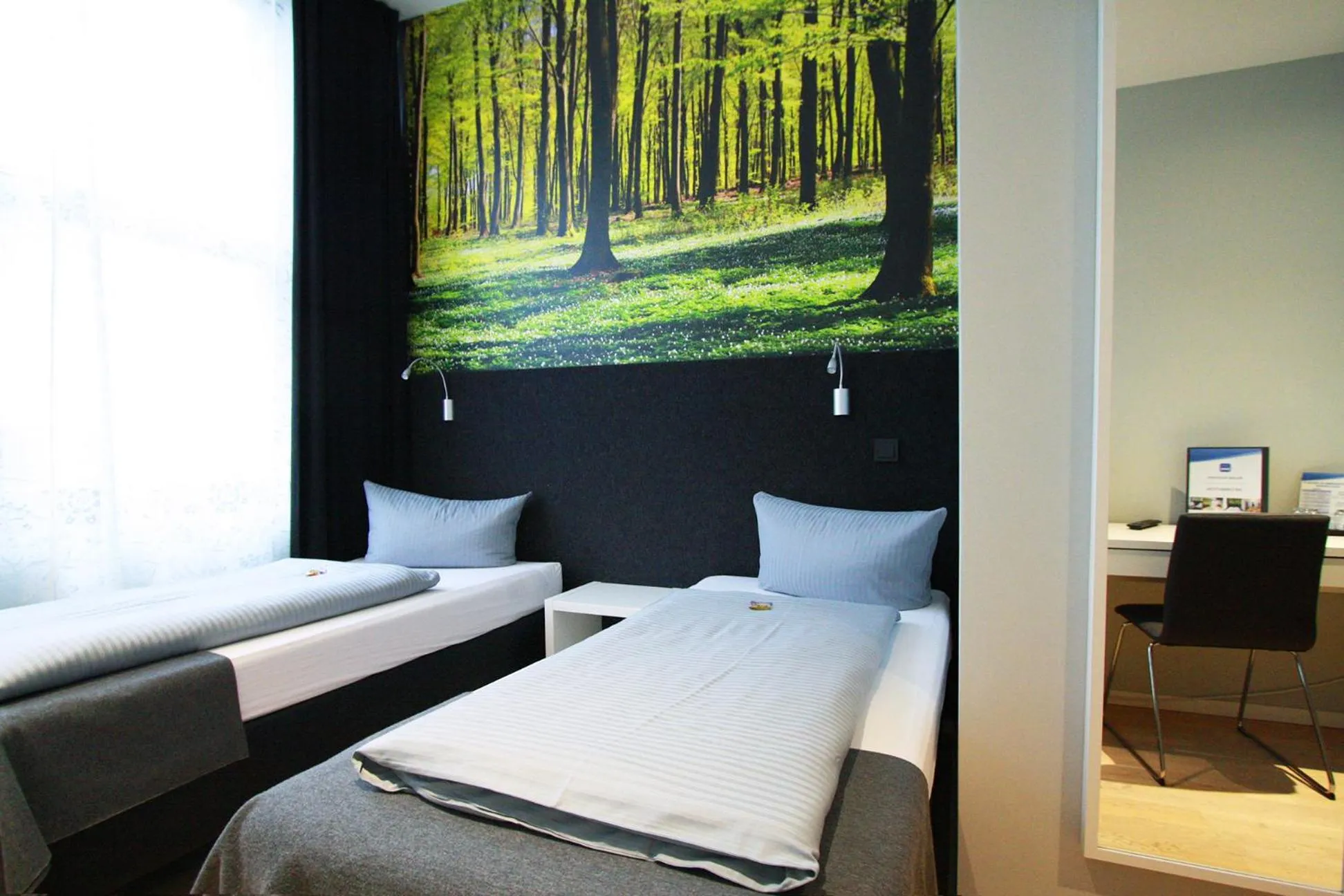 Photo of the whole room, Bed in ARRIVEL Hotel Kirchheim - bisher Novitel