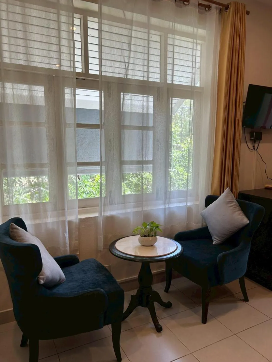 Seating area in The Journey House Lifestyle Boutique Hotel