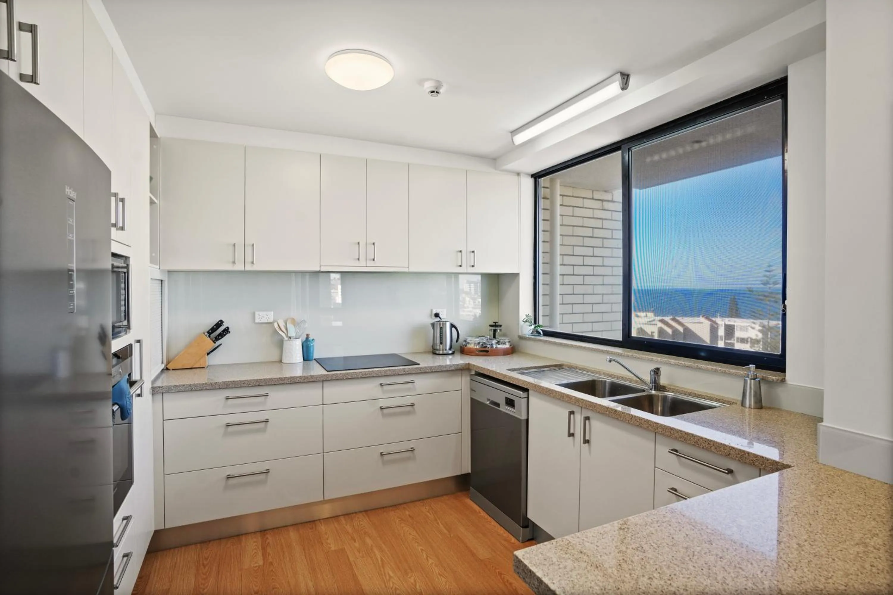 Kitchen or kitchenette in Burgess @ Kings Beach Apartments