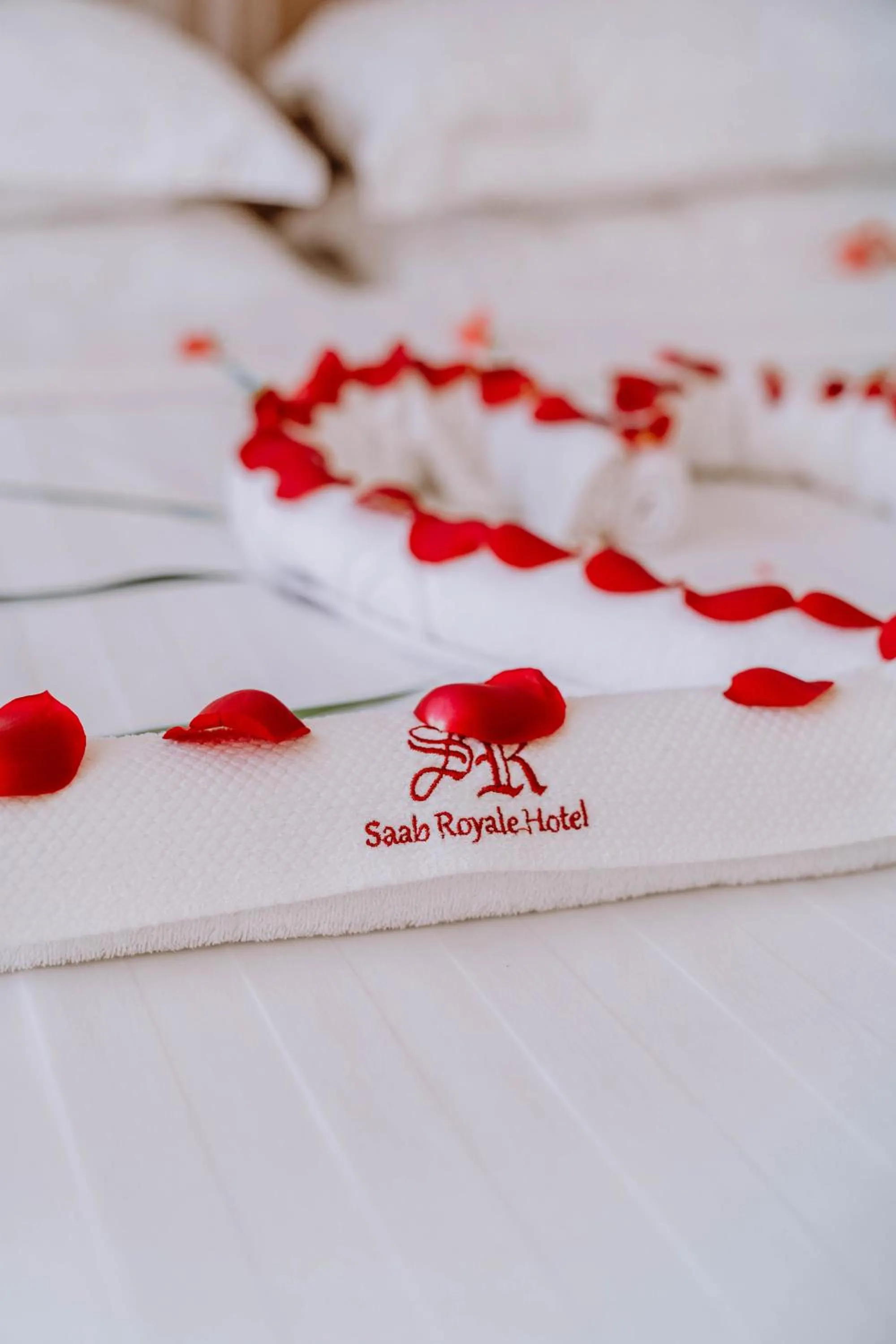 Bed in Saab Royale Hotel