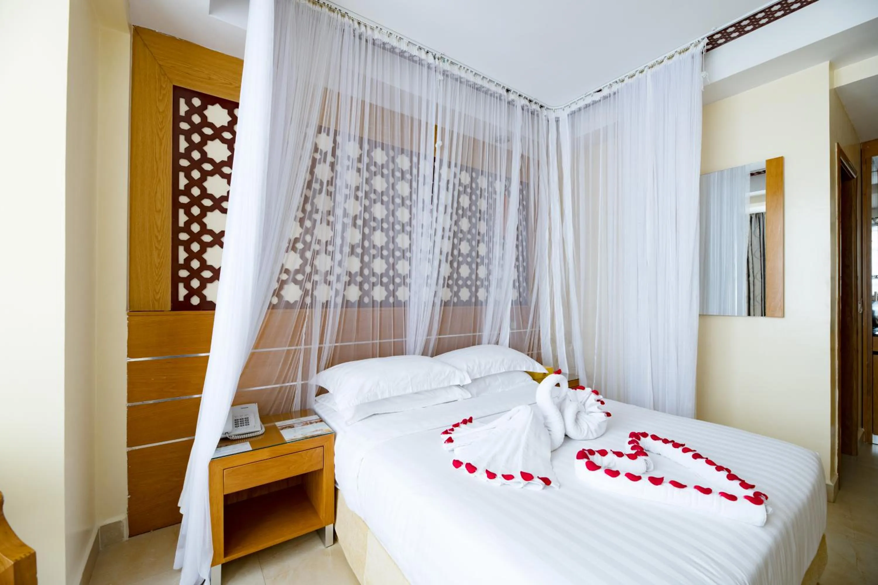 Bed in Saab Royale Hotel