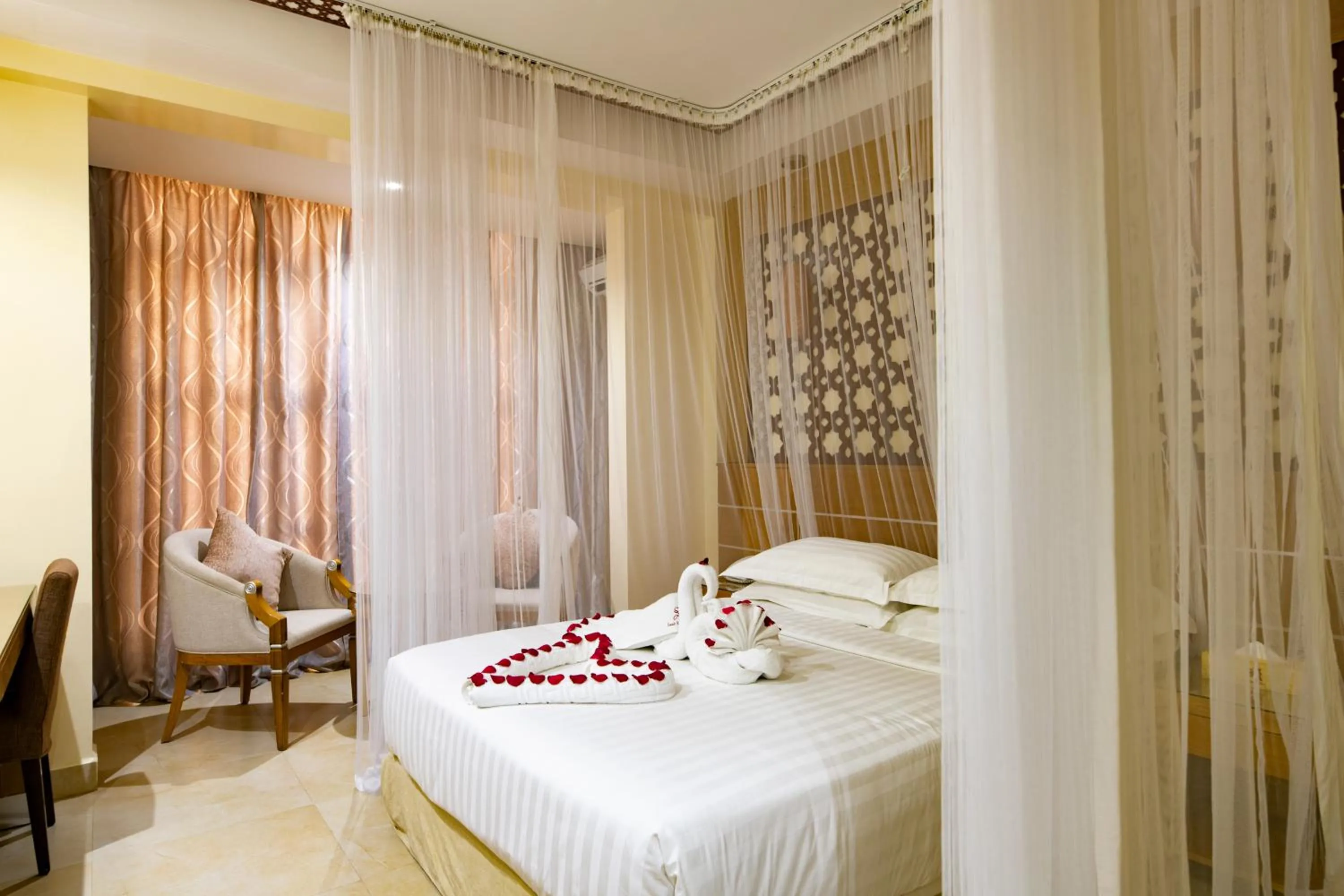 Bed in Saab Royale Hotel