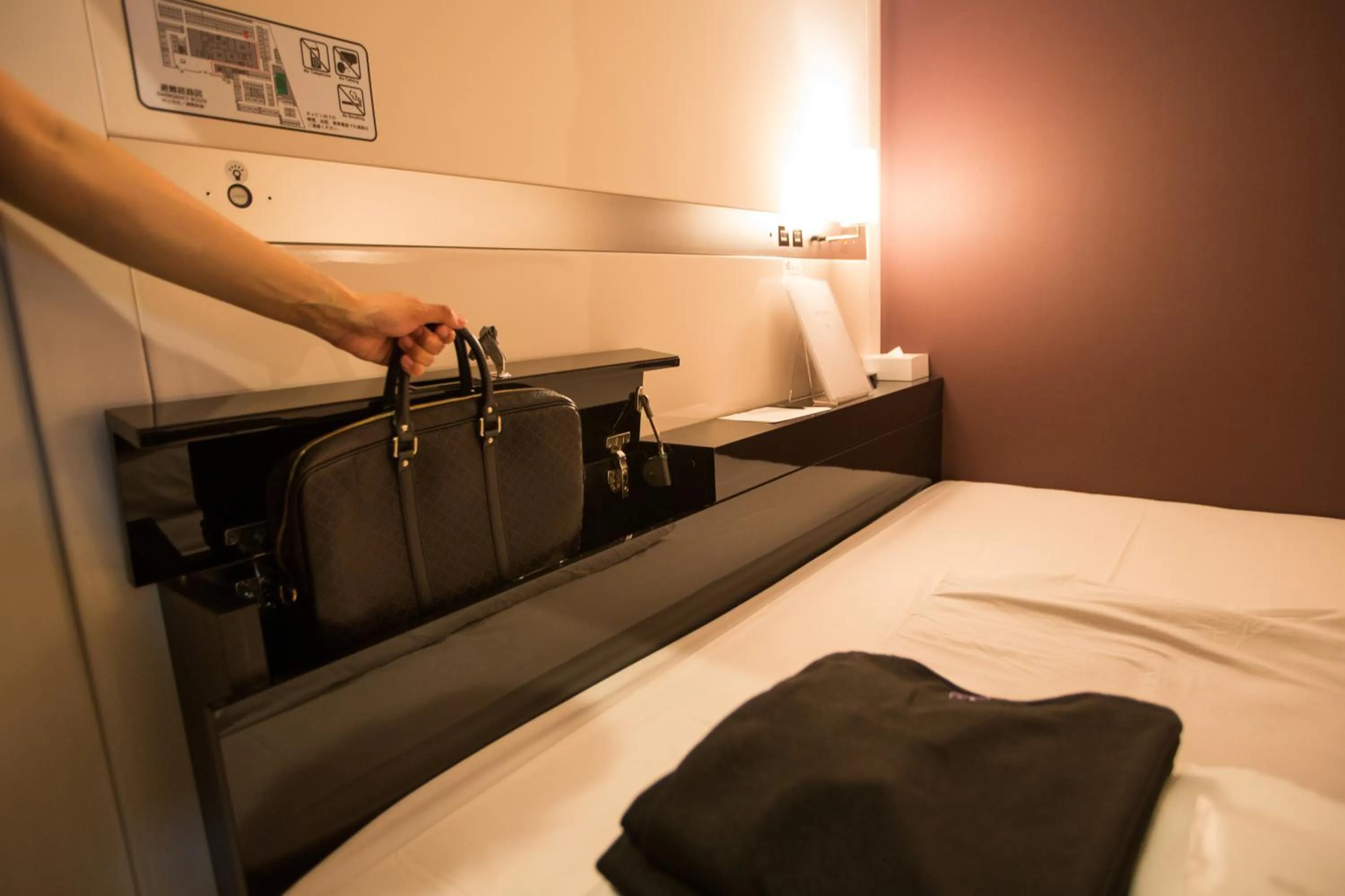 Photo of the whole room, Bed in First Cabin Shinbashi Atagoyama