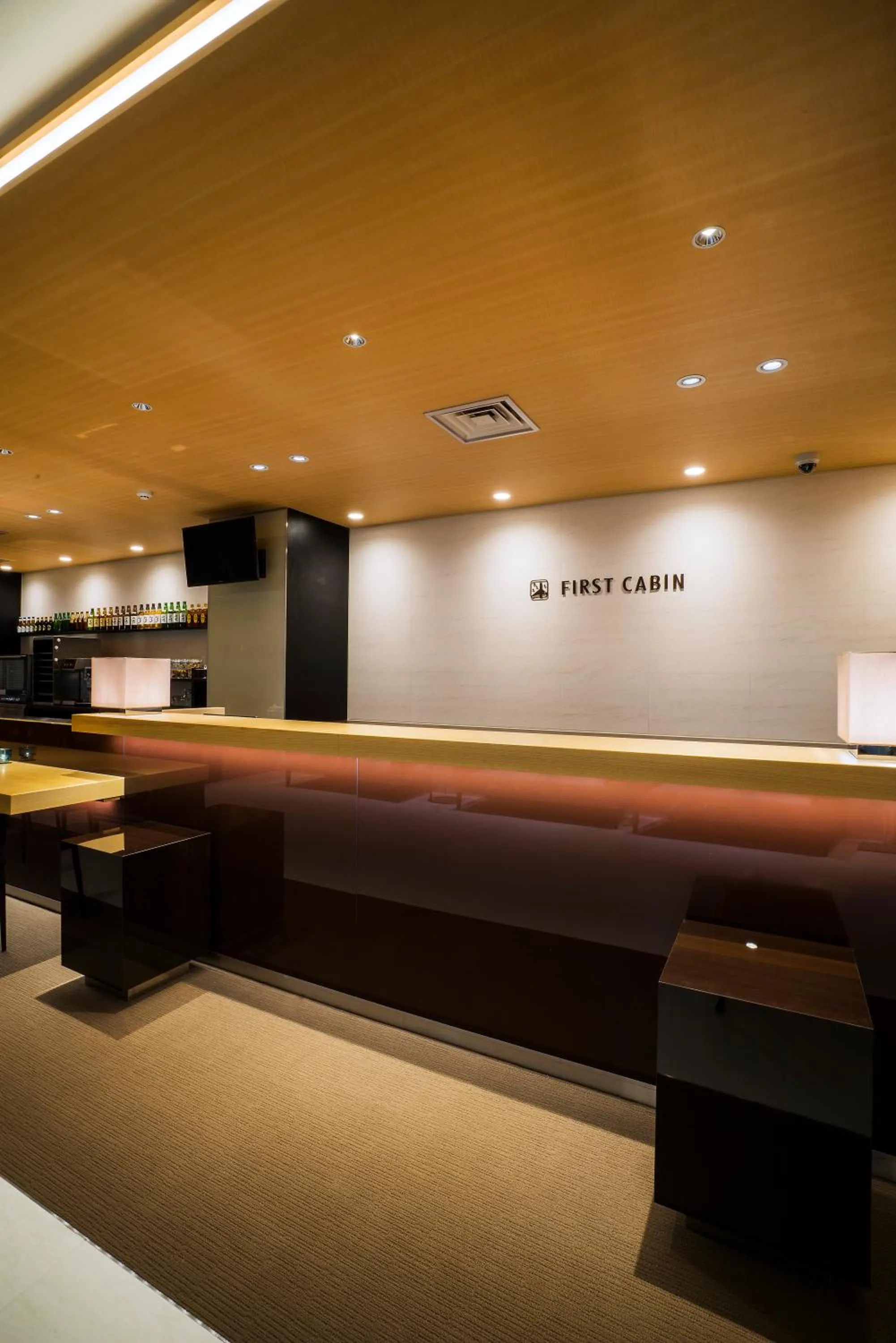 Communal lounge/ TV room in First Cabin Shinbashi Atagoyama