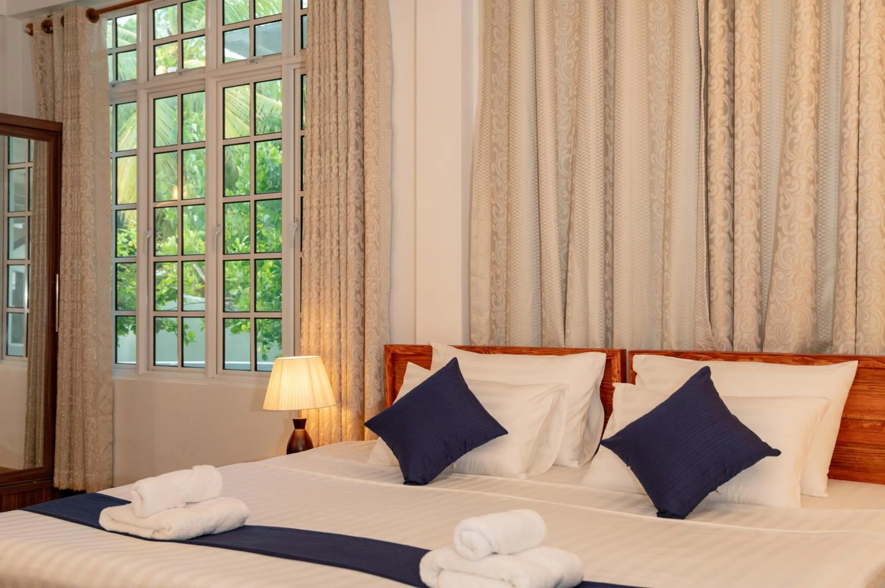 Bedroom, Bed in Biosphere Inn