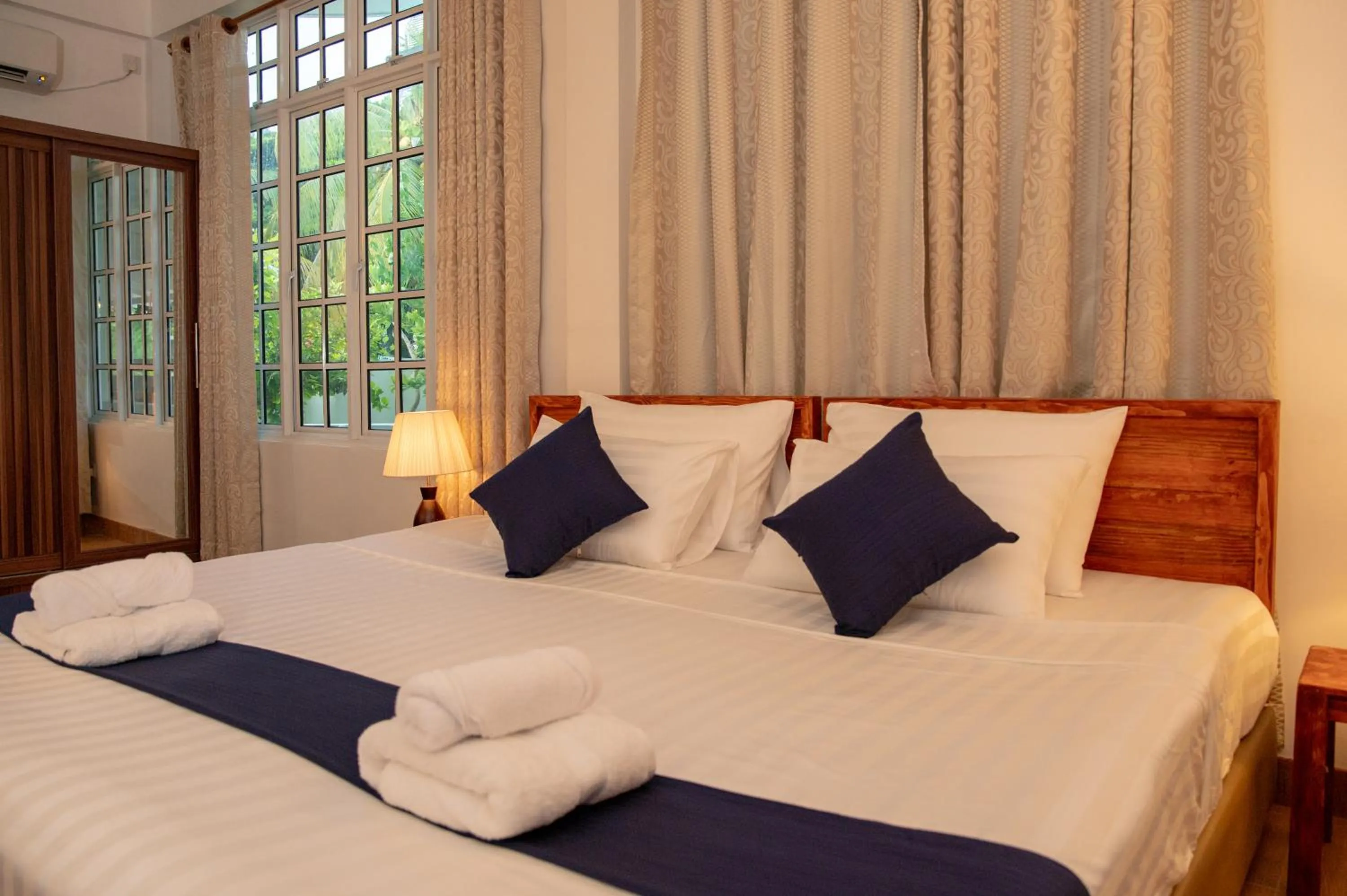 Bedroom, Bed in Biosphere Inn