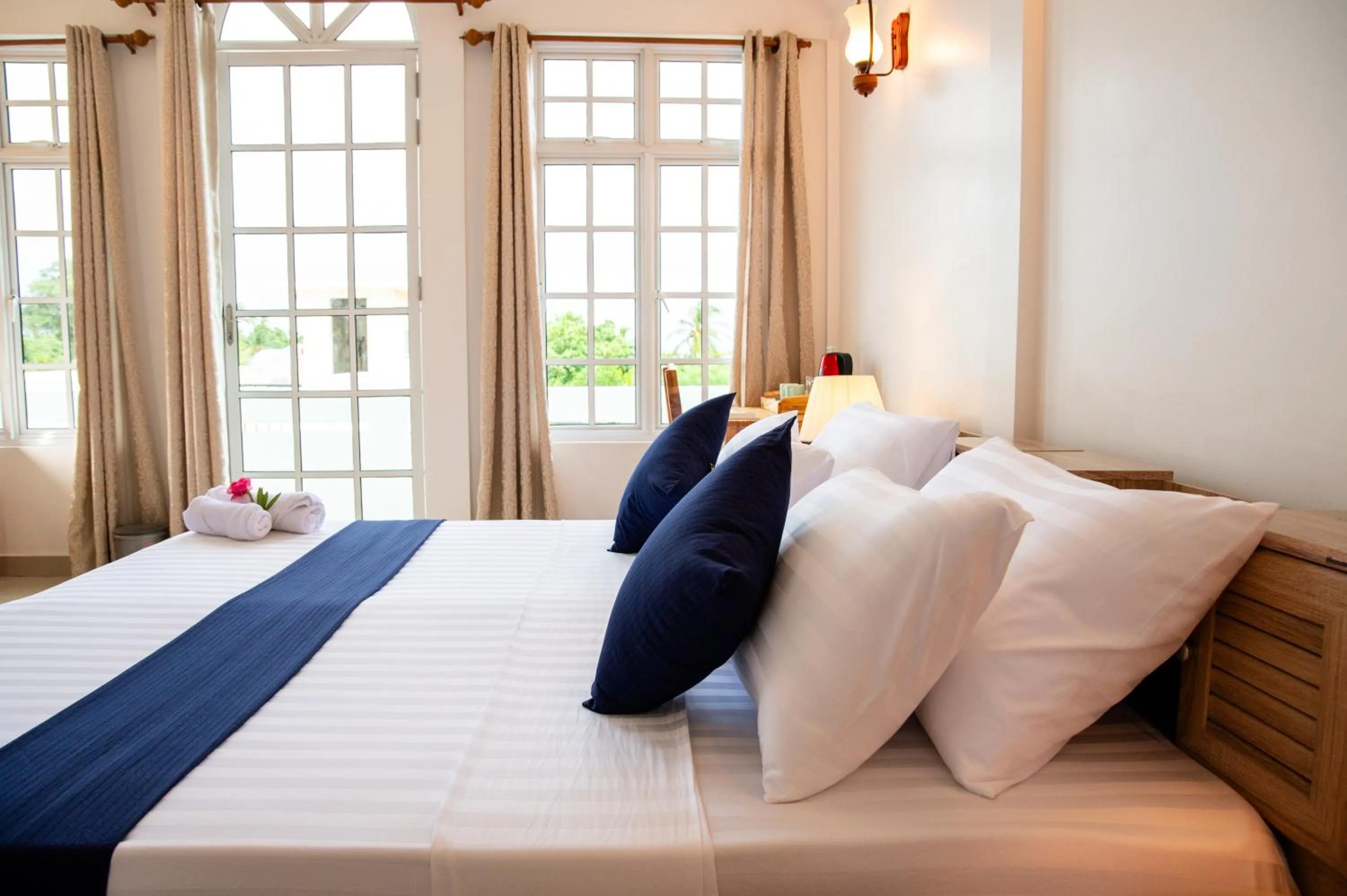 Bedroom, Bed in Biosphere Inn