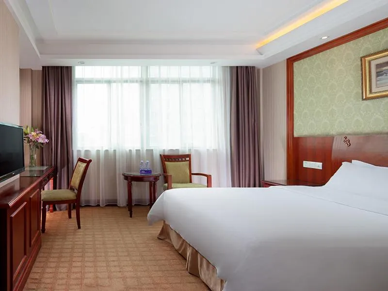 Bed in Vienna Hotel Dongguan Songshan Lake