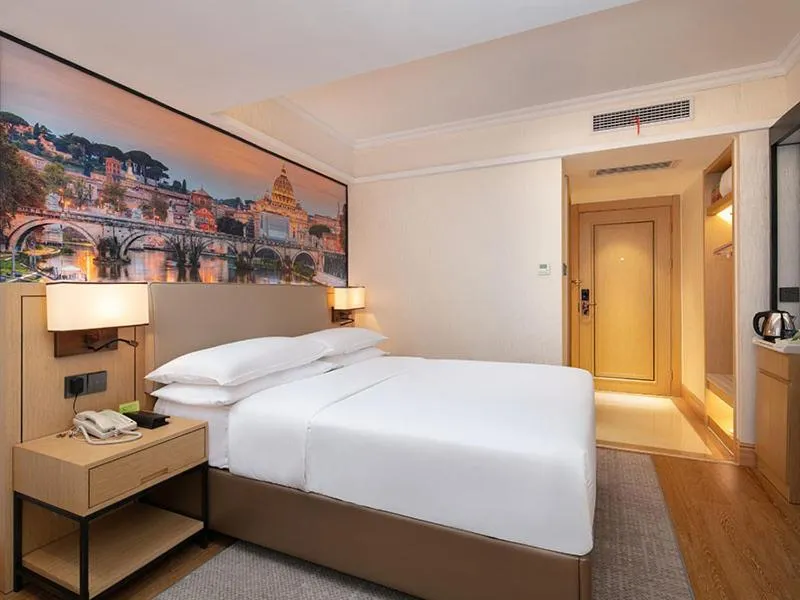 Bed in Vienna International Hotel Changsha Furong Plaza