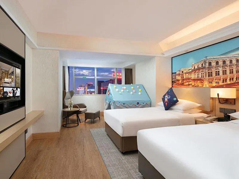 Bed in Vienna International Hotel Changsha Furong Plaza