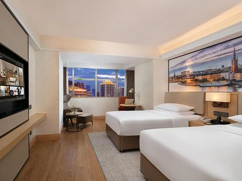 Bed in Vienna International Hotel Changsha Furong Plaza