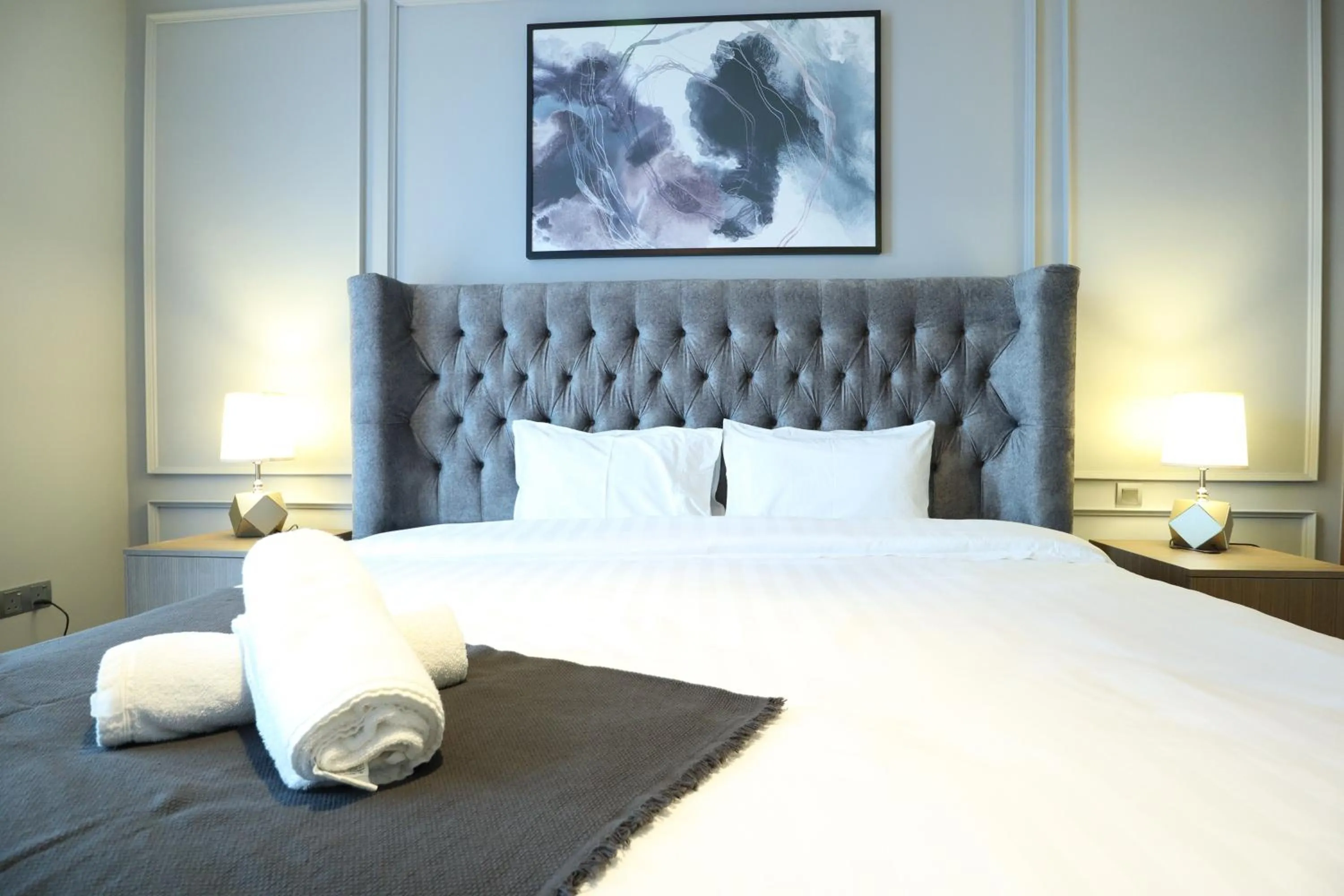 Bed in Leo Guesthouse at Anggun Residence Suite