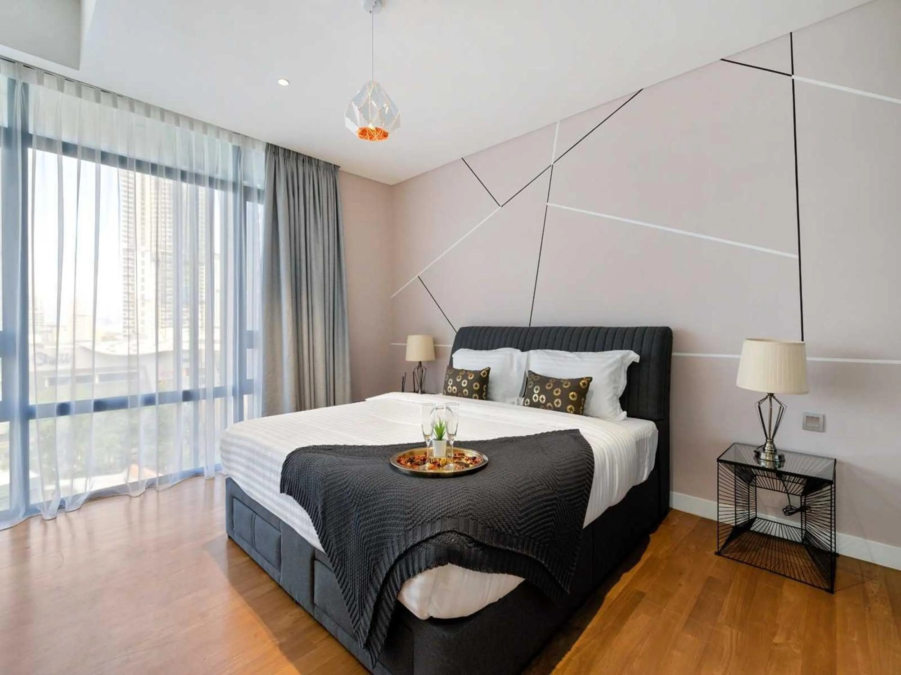 Bedroom, Bed in Leo Guesthouse at Anggun Residence Suite