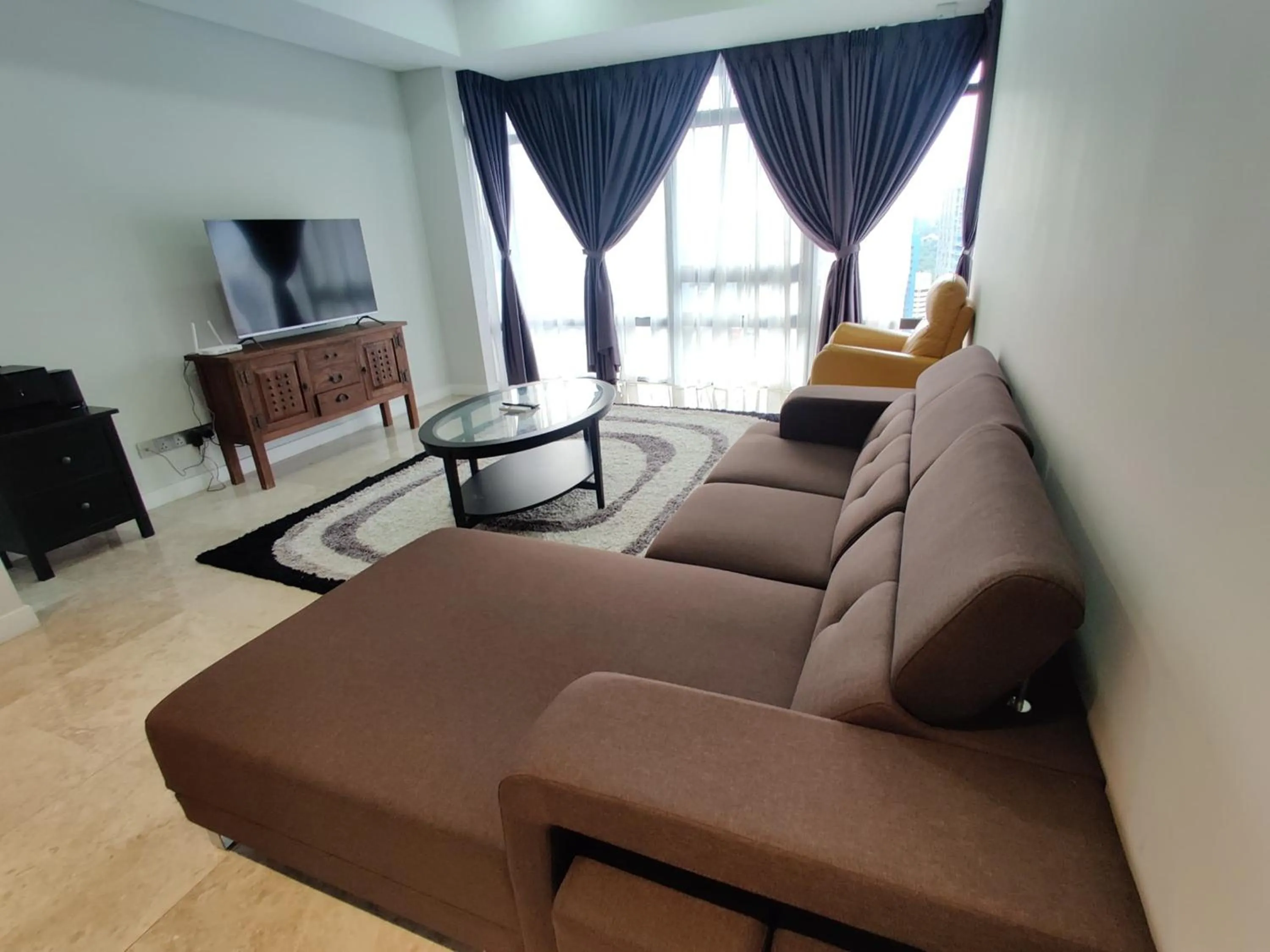 TV and multimedia in Leo Guesthouse at Anggun Residence Suite