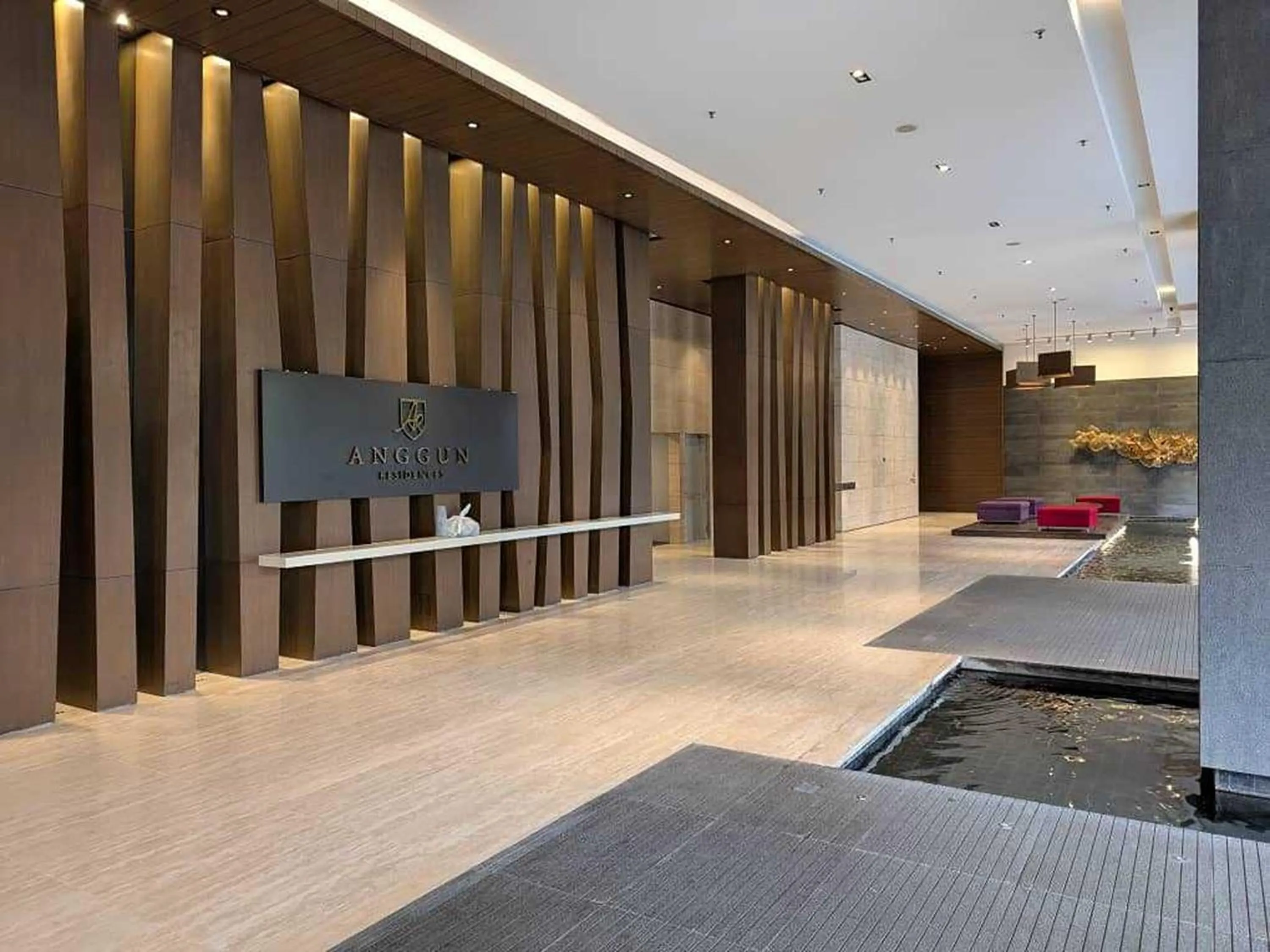 Lobby or reception, Bed in Leo Guesthouse at Anggun Residence Suite