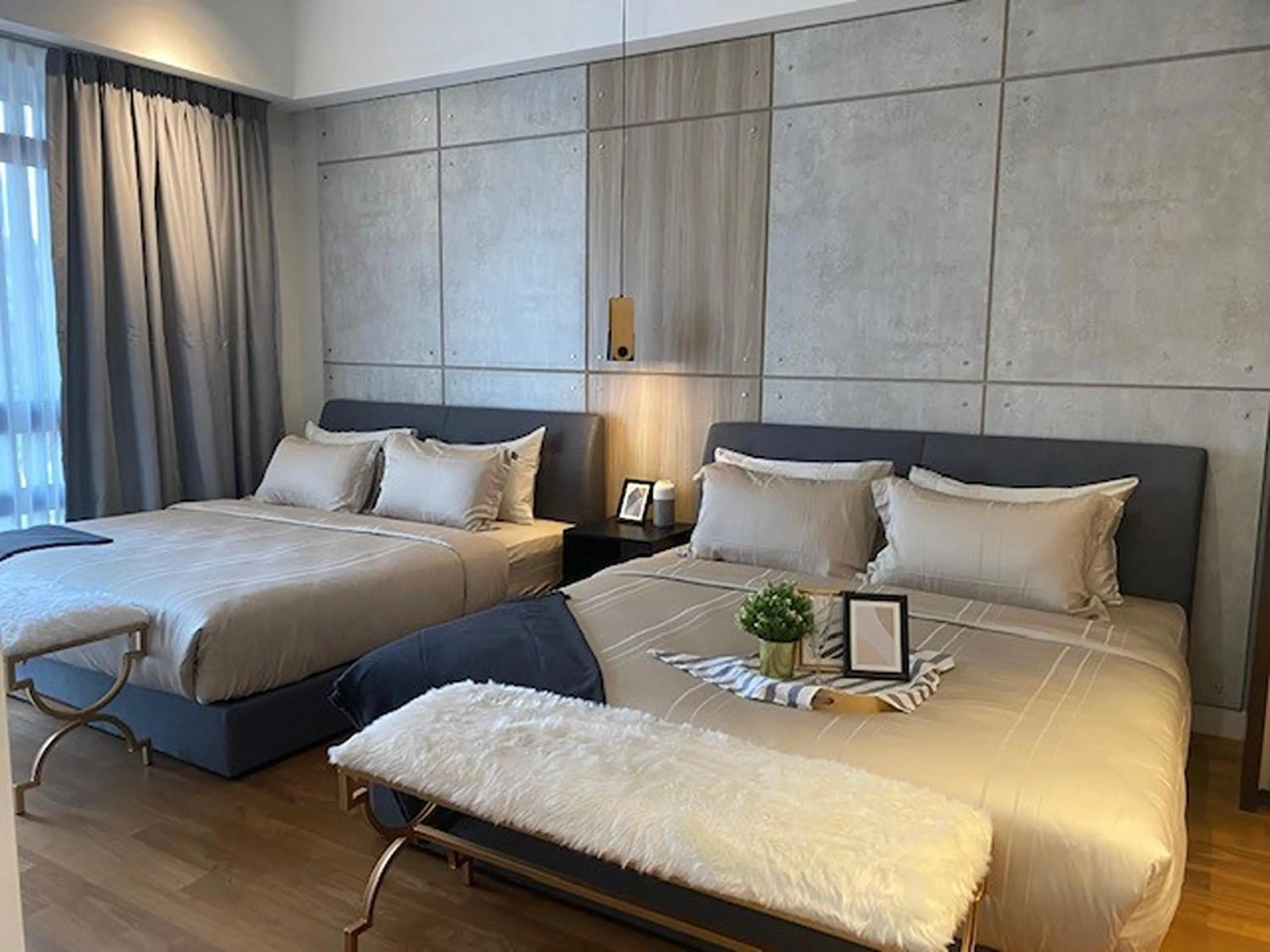 Bed in Leo Guesthouse at Anggun Residence Suite