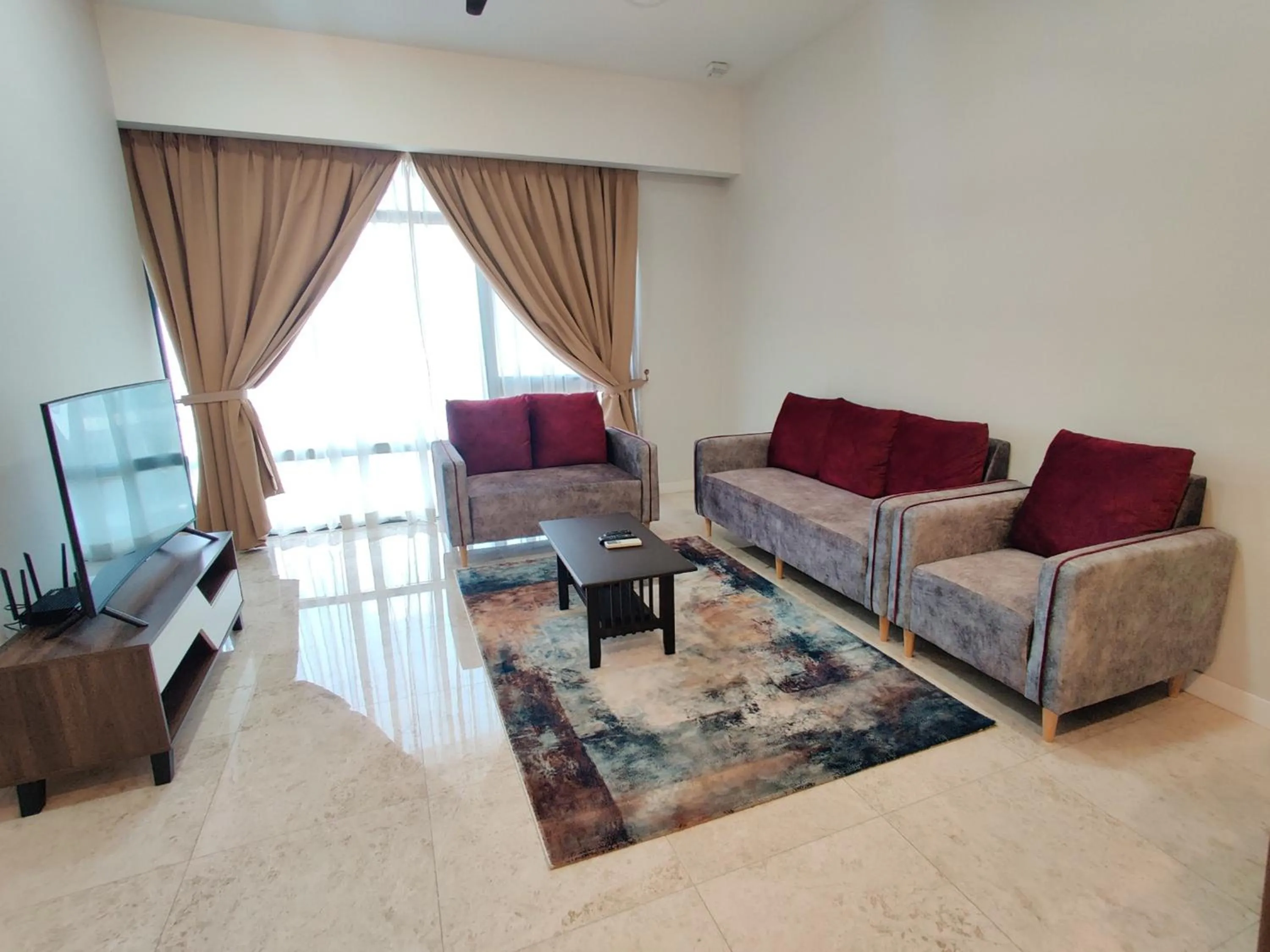 TV and multimedia in Leo Guesthouse at Anggun Residence Suite