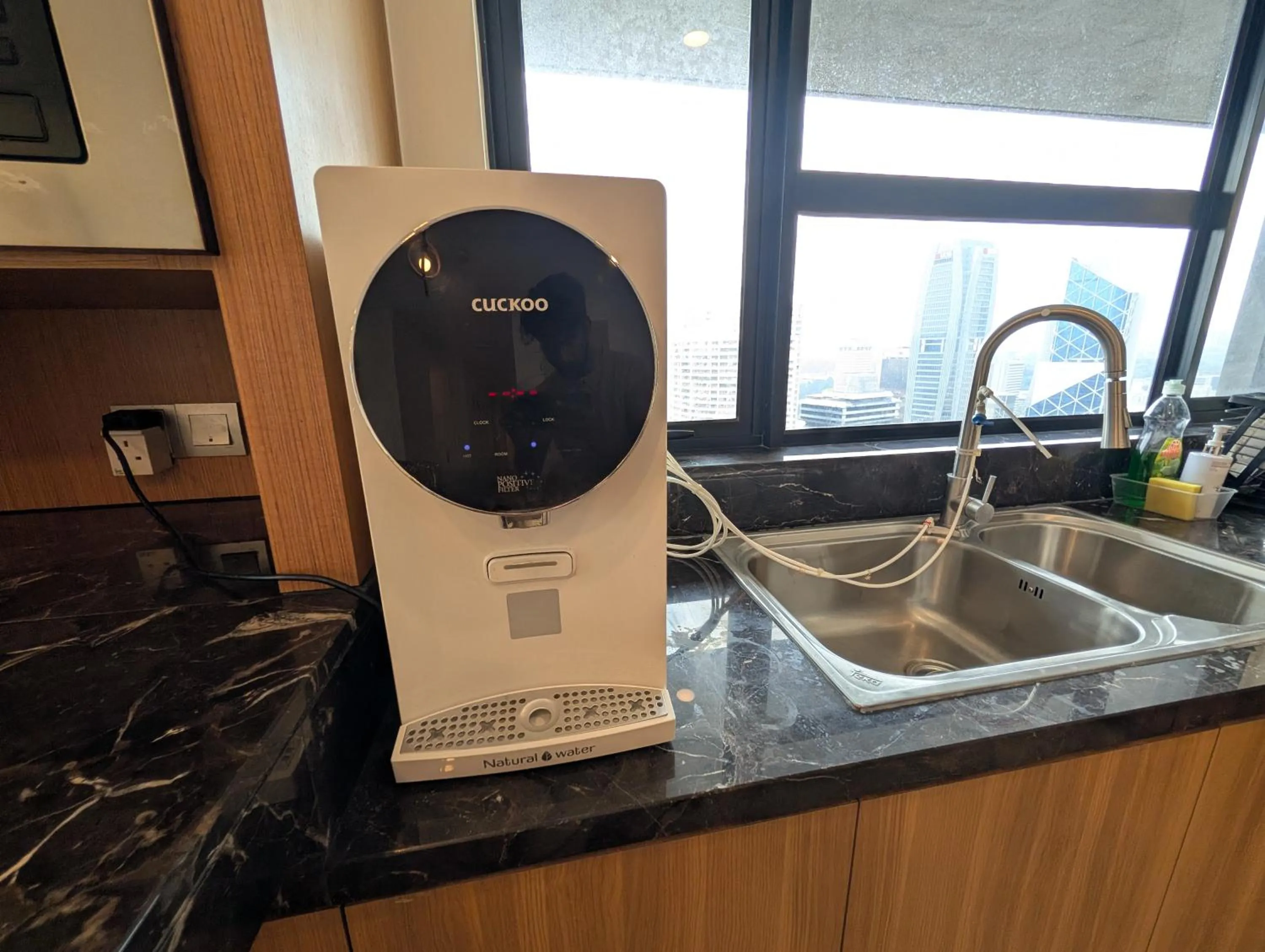 Kitchen or kitchenette in Leo Guesthouse at Anggun Residence Suite