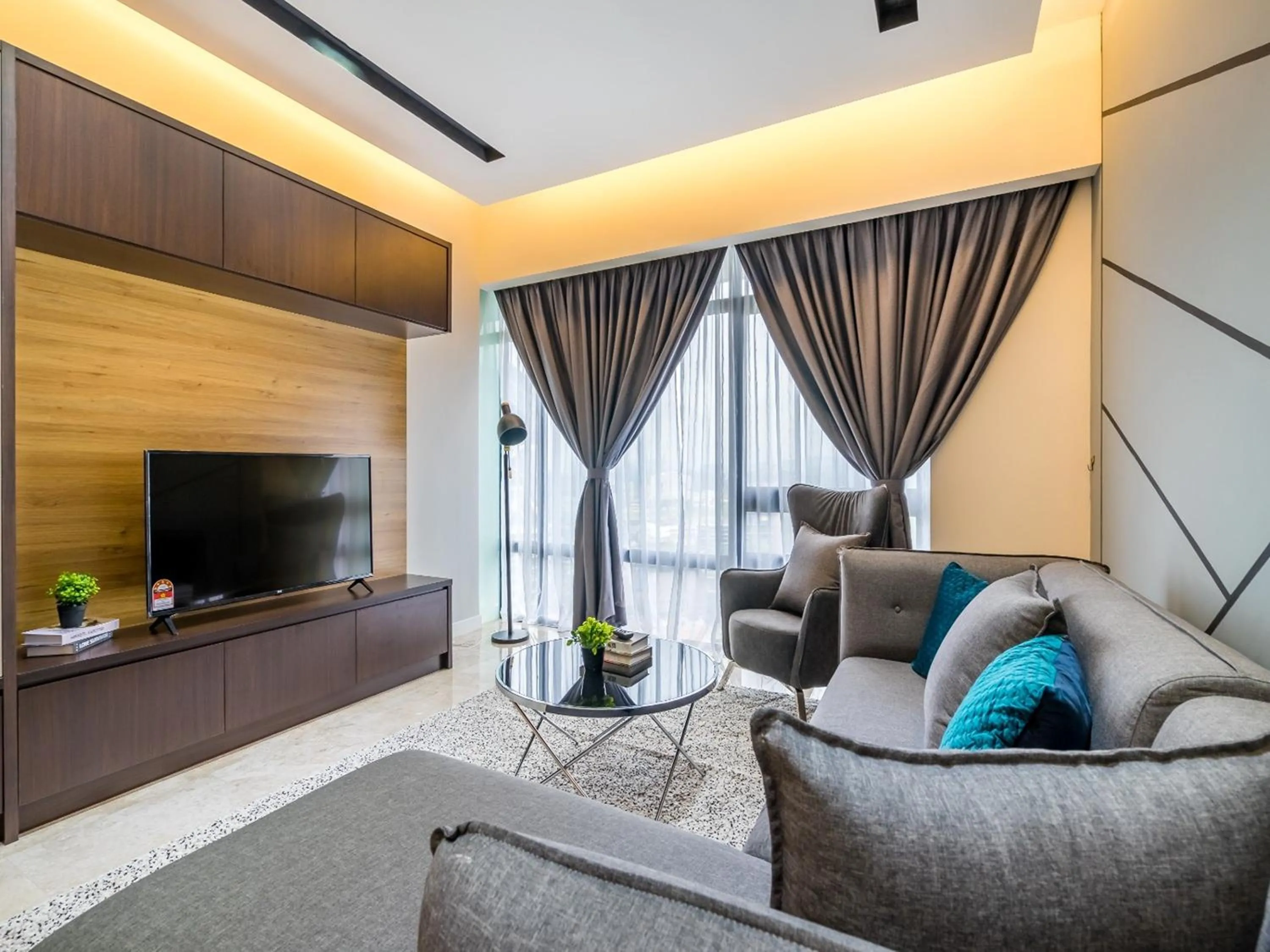 TV and multimedia in Leo Guesthouse at Anggun Residence Suite