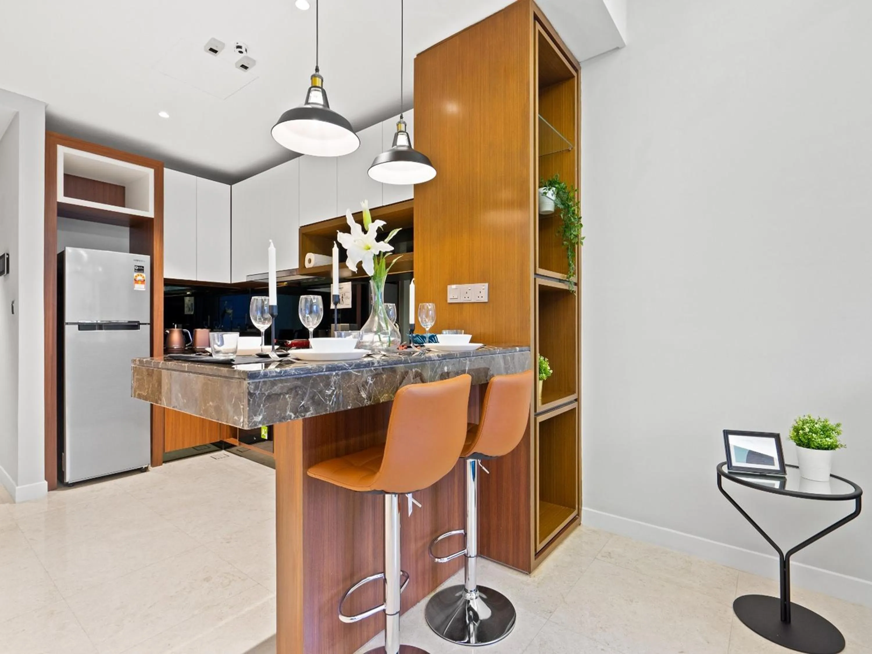 Kitchen or kitchenette in Leo Guesthouse at Anggun Residence Suite