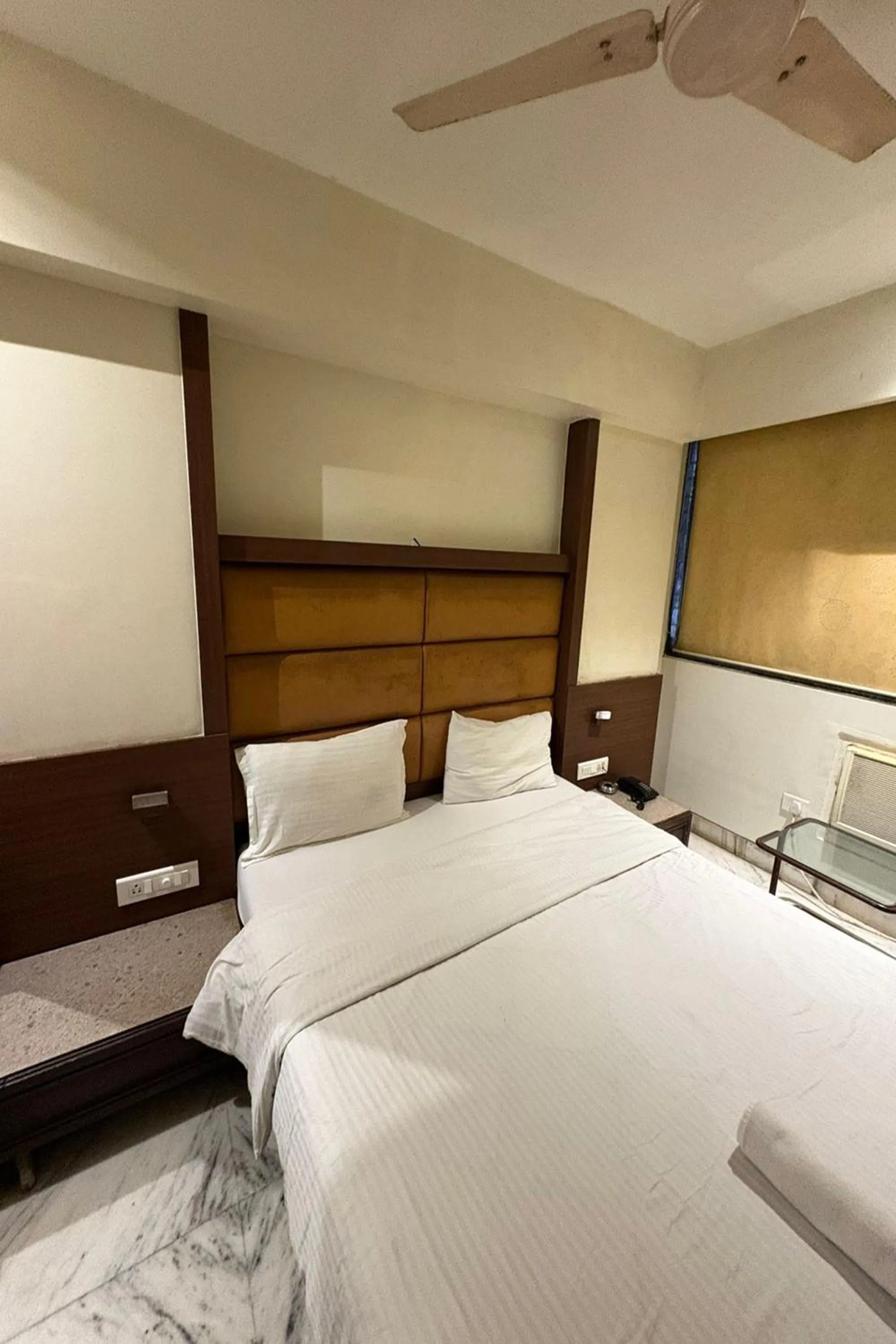 Bed in Pravasi Residency