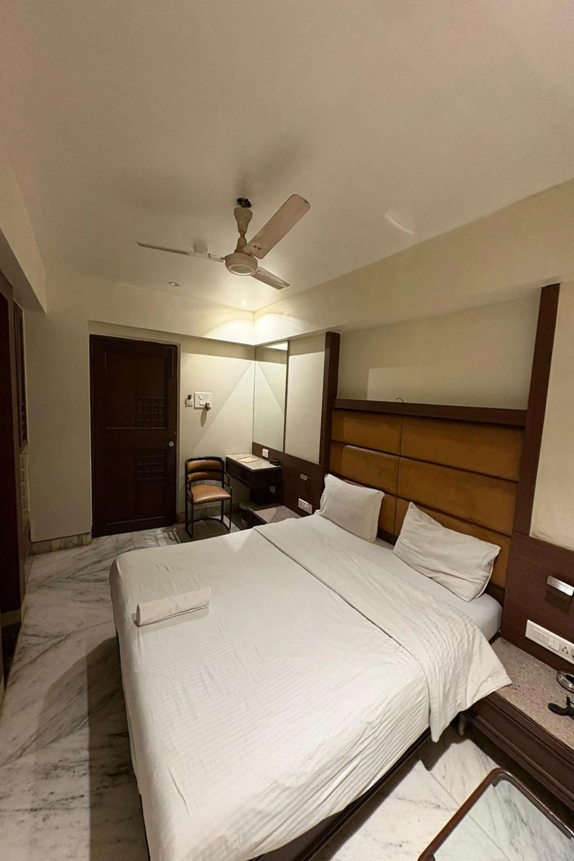 Bed in Pravasi Residency