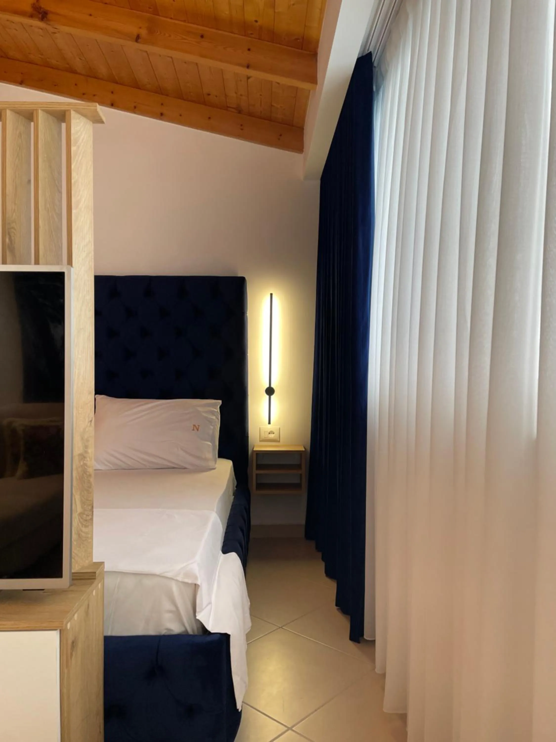 Bed in Qeparo Napolon Complex