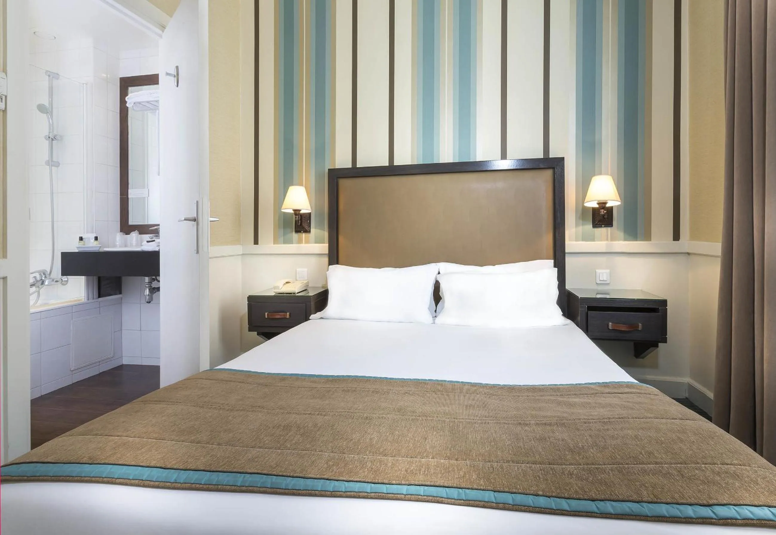 Bed in Elysees Apartments