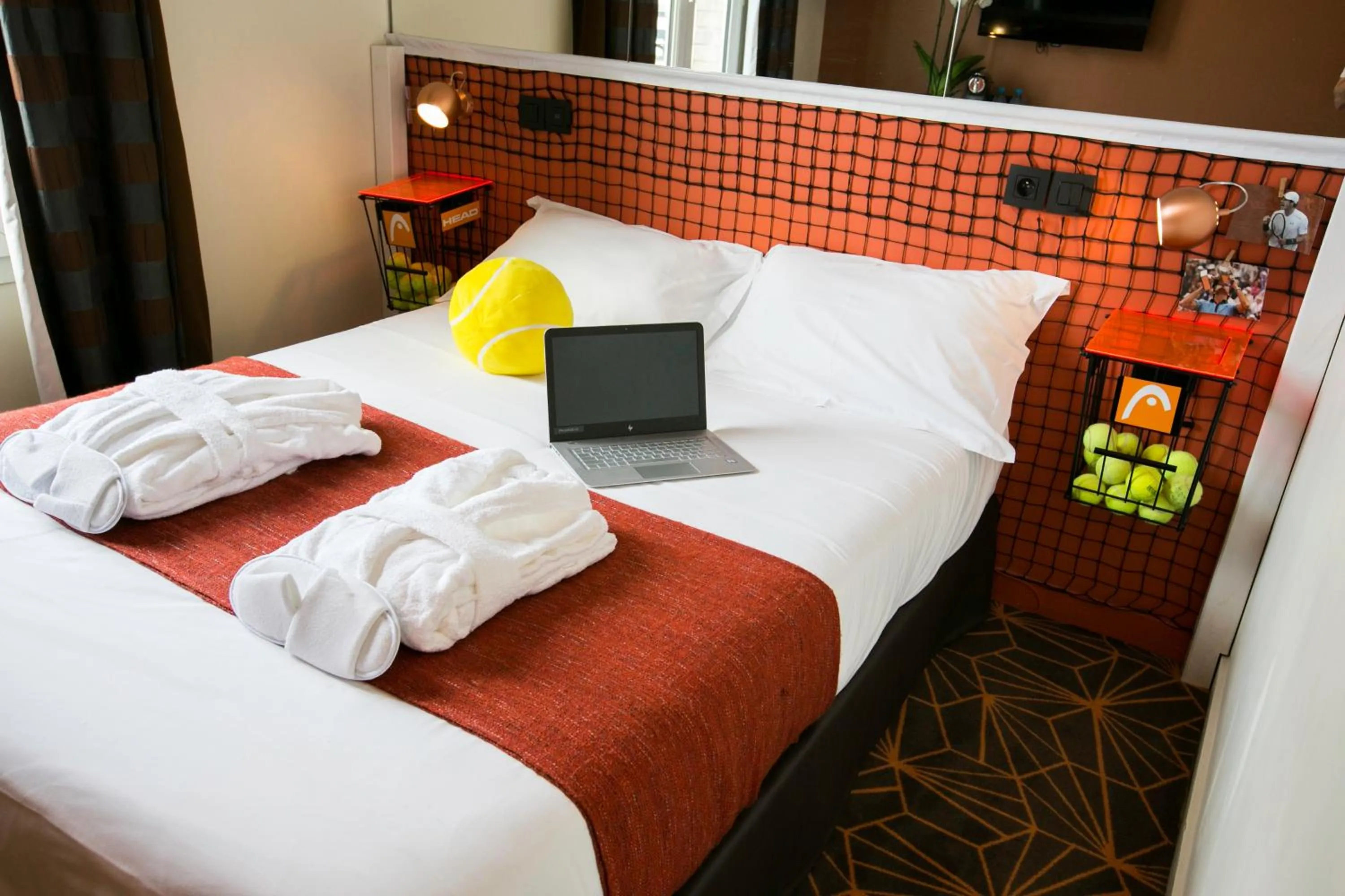 Bed in Hotel Olympic Paris Boulogne by Patrick Hayat