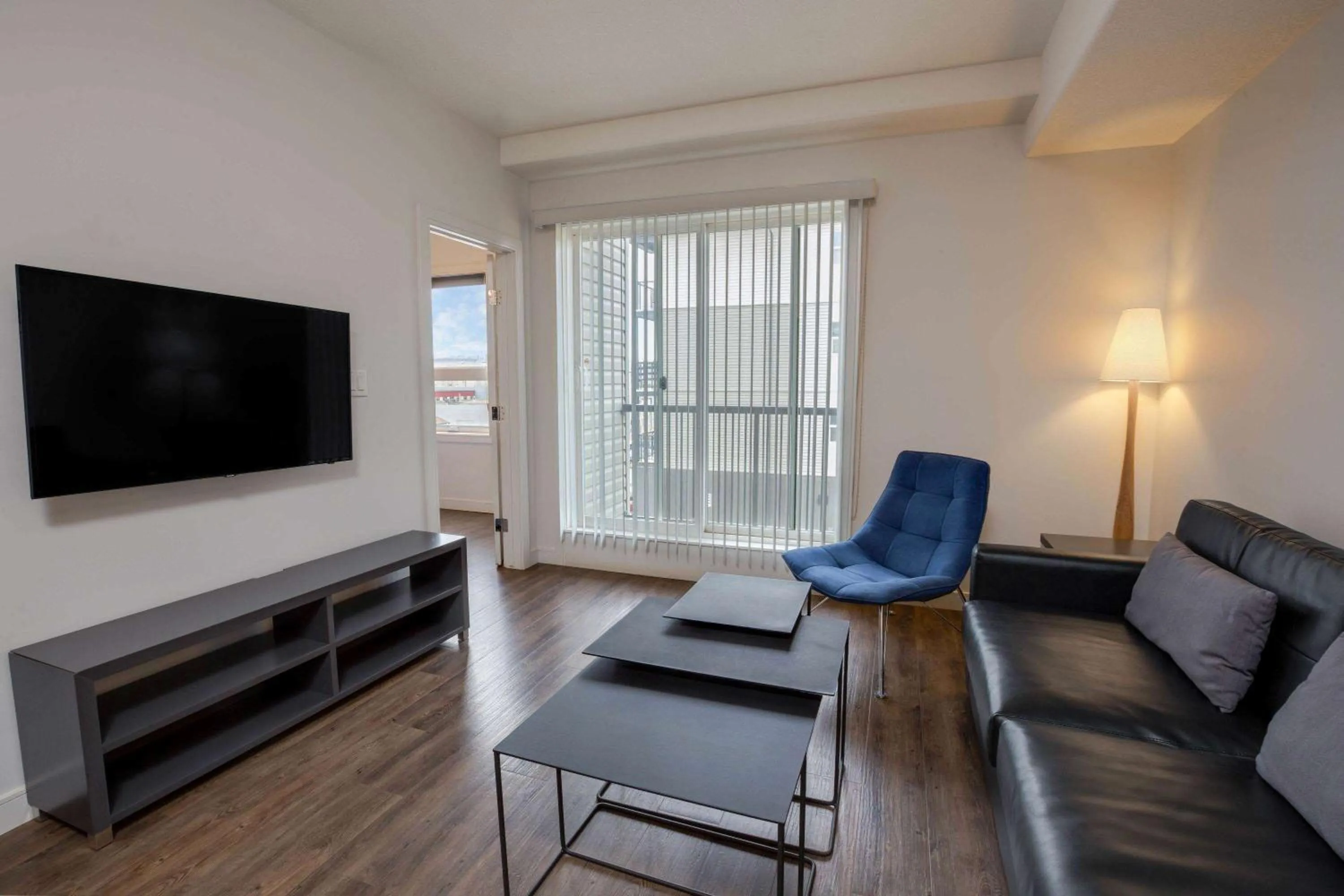 Photo of the whole room, Seating Area in Ramada by Wyndham Fort McMurray