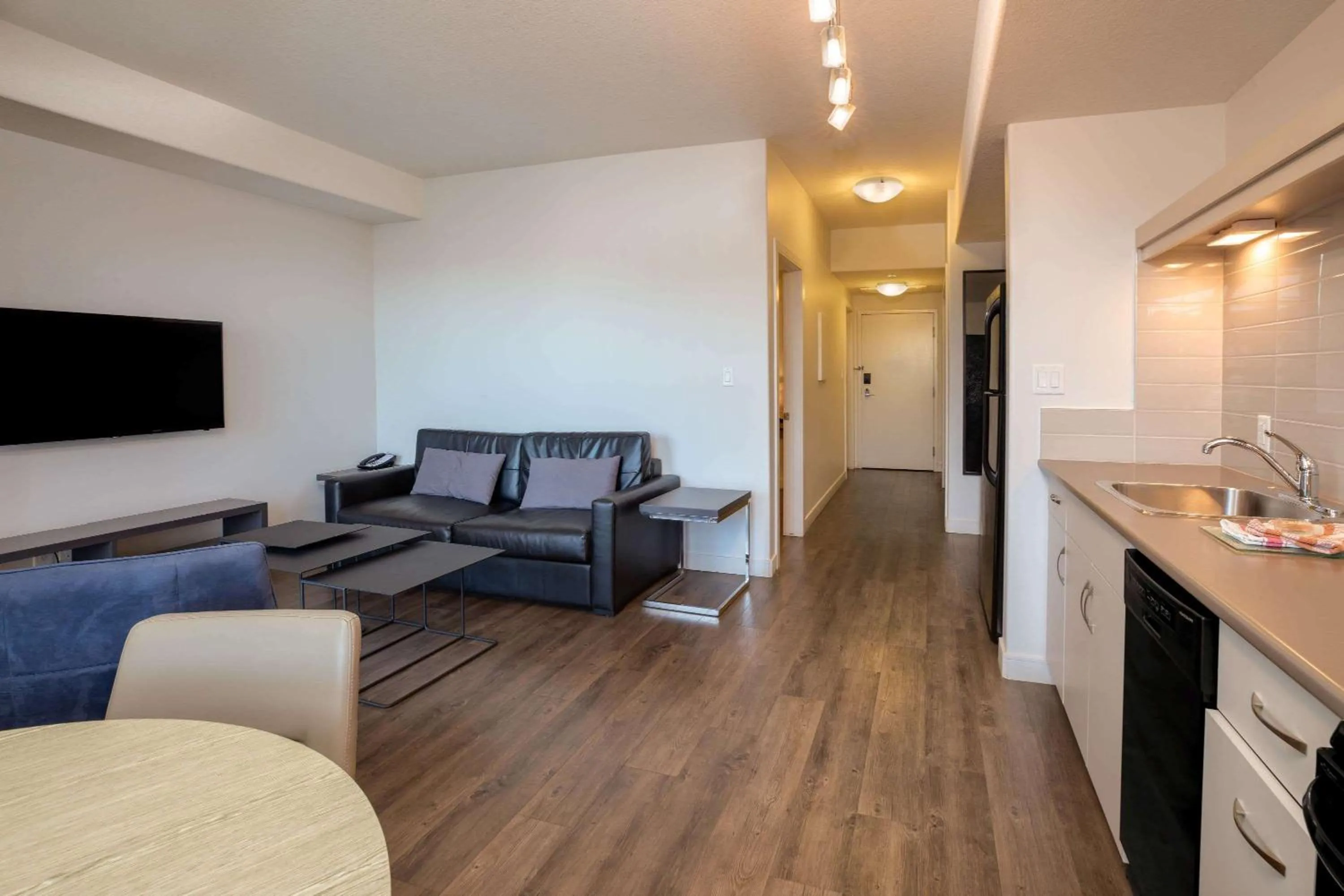 Photo of the whole room, Seating Area in Ramada by Wyndham Fort McMurray