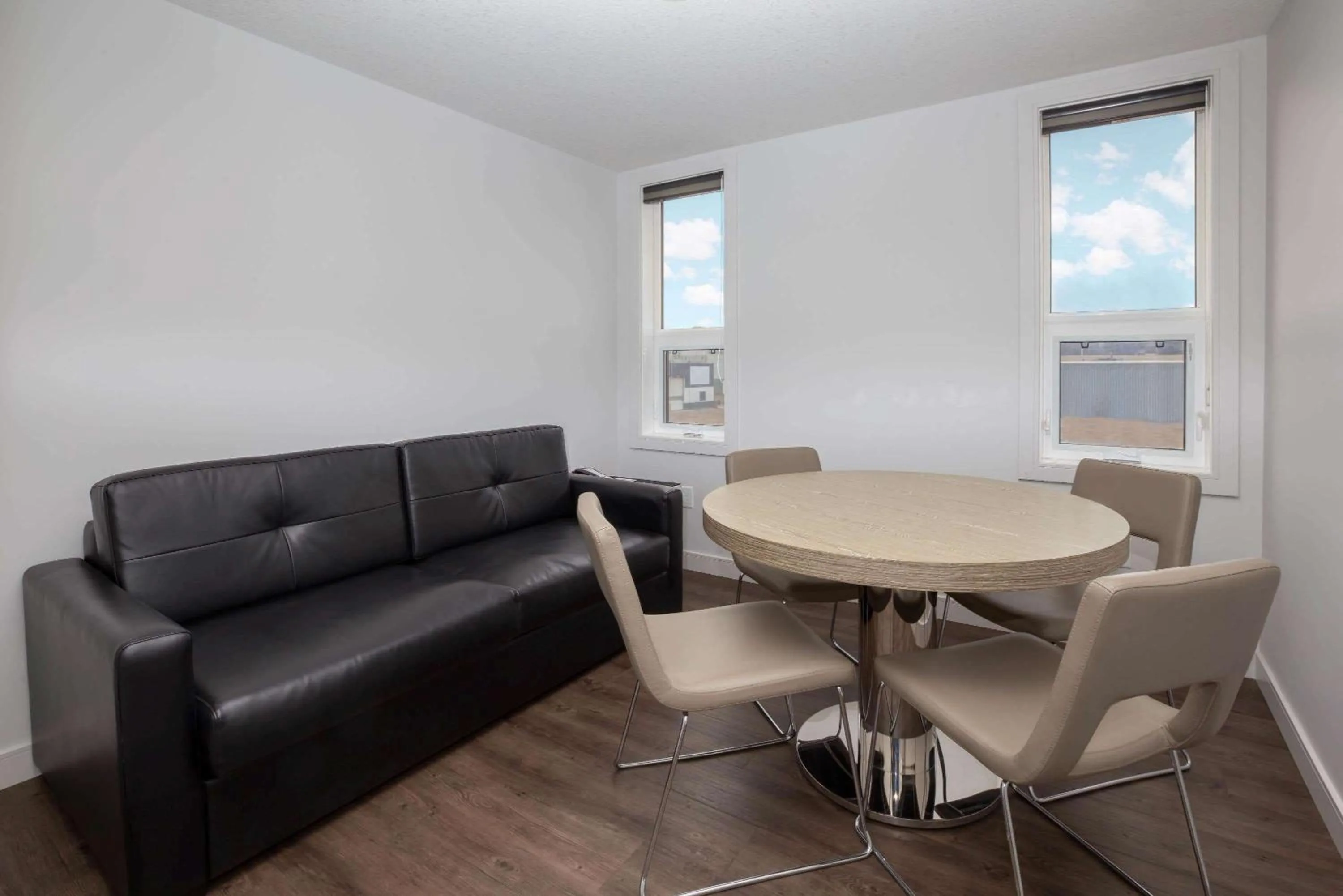 Living room, Dining Area in Ramada by Wyndham Fort McMurray