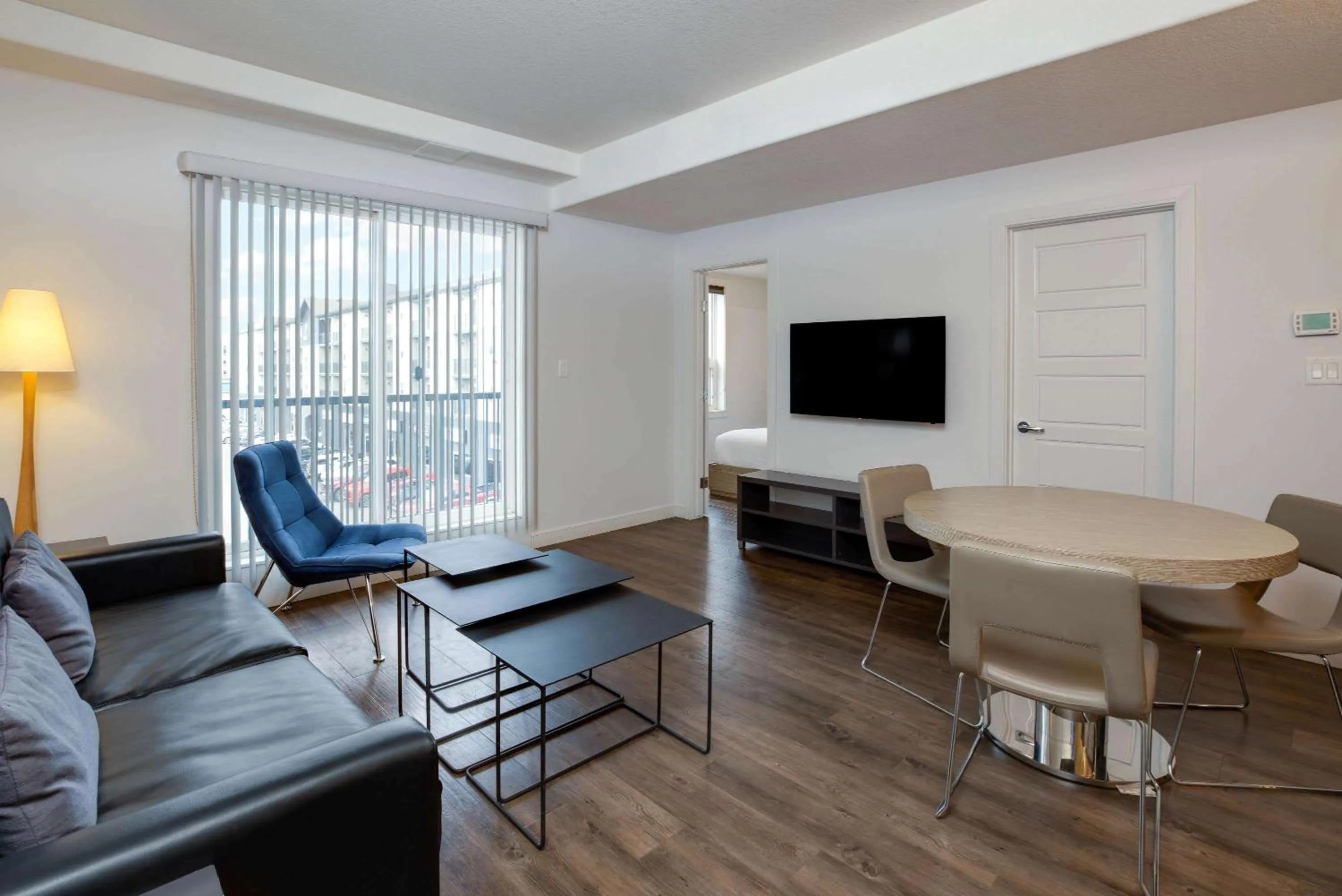 Photo of the whole room, Seating Area in Ramada by Wyndham Fort McMurray