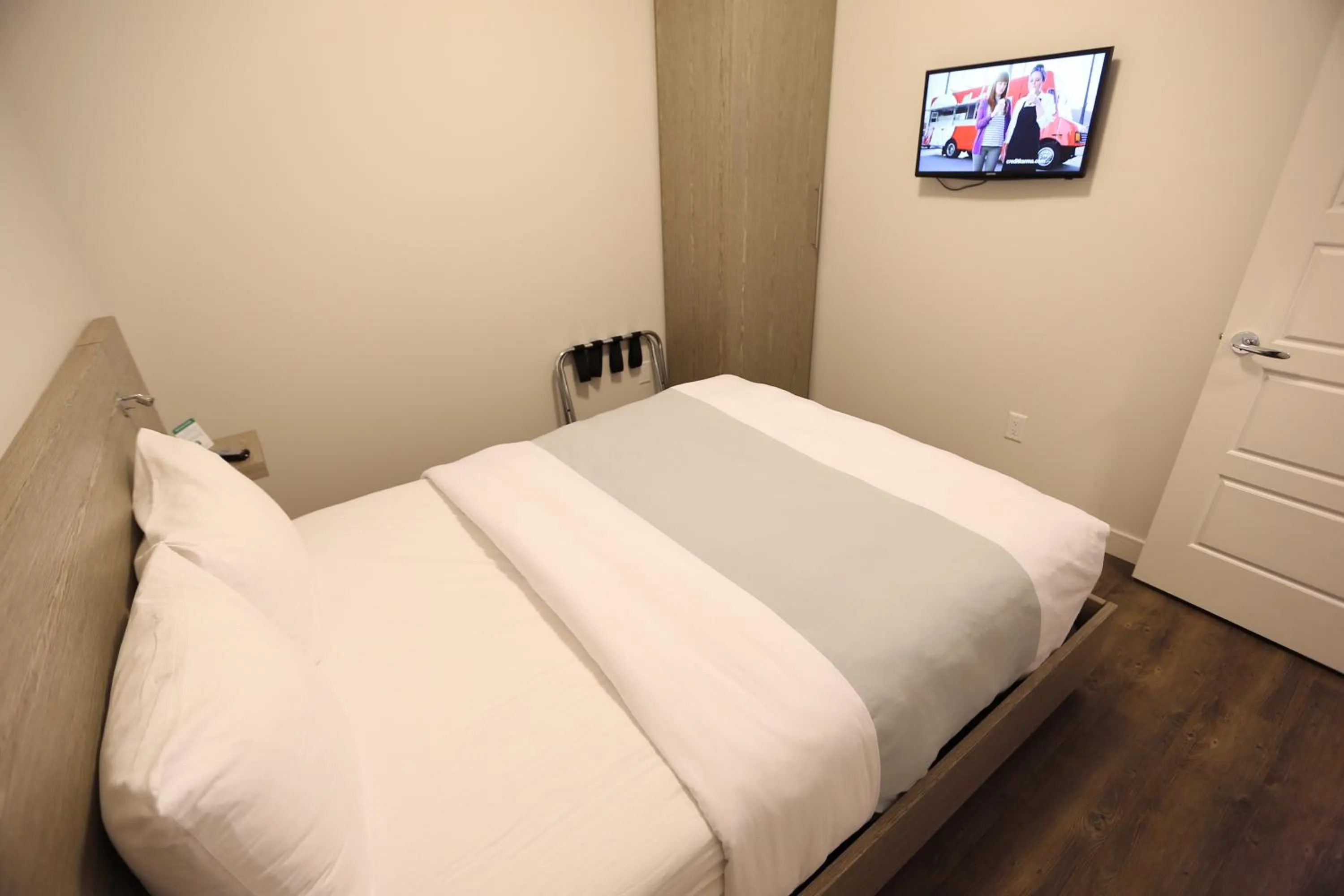 Bed in Ramada by Wyndham Fort McMurray