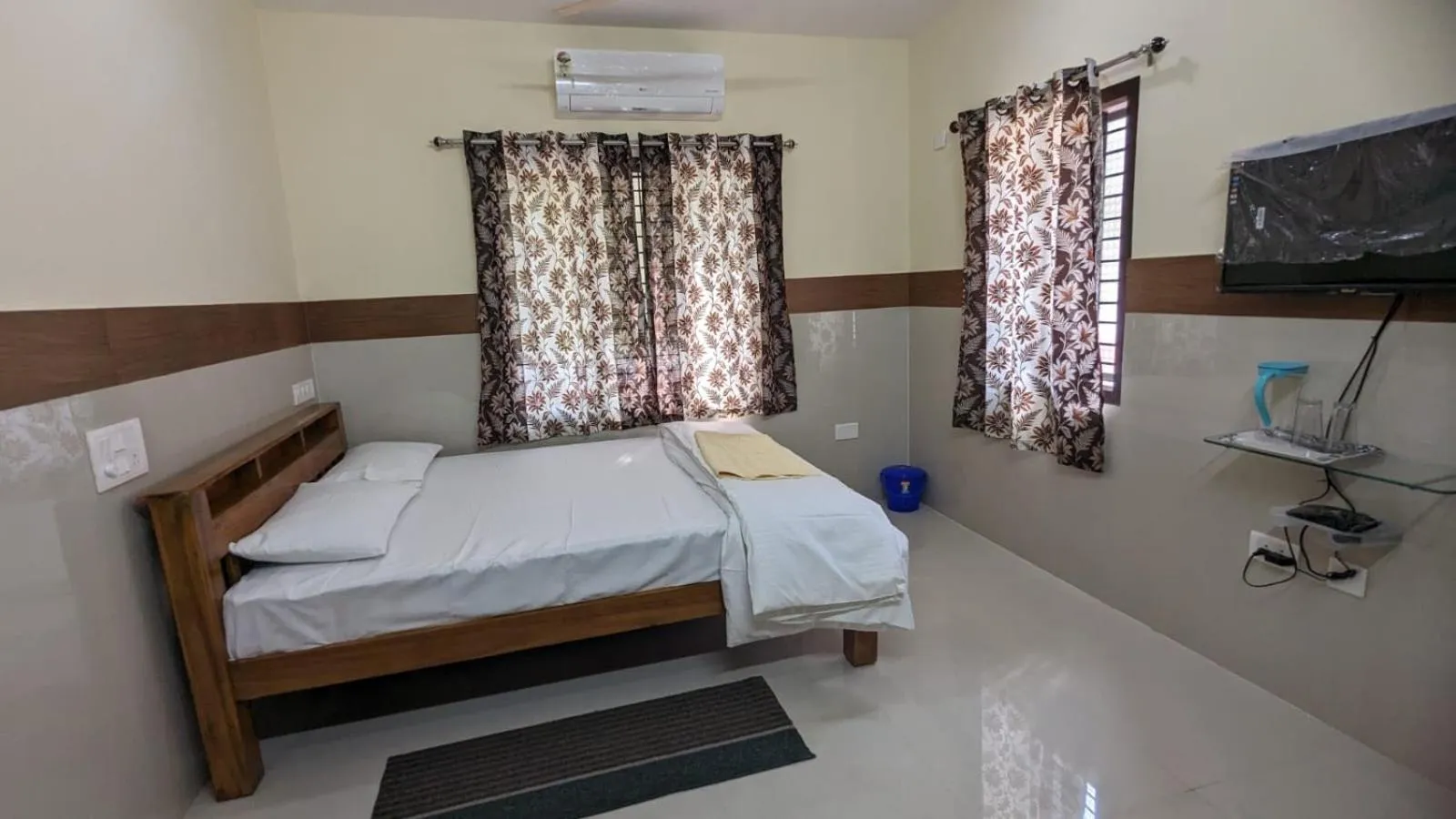 Bed in Janardan Residency