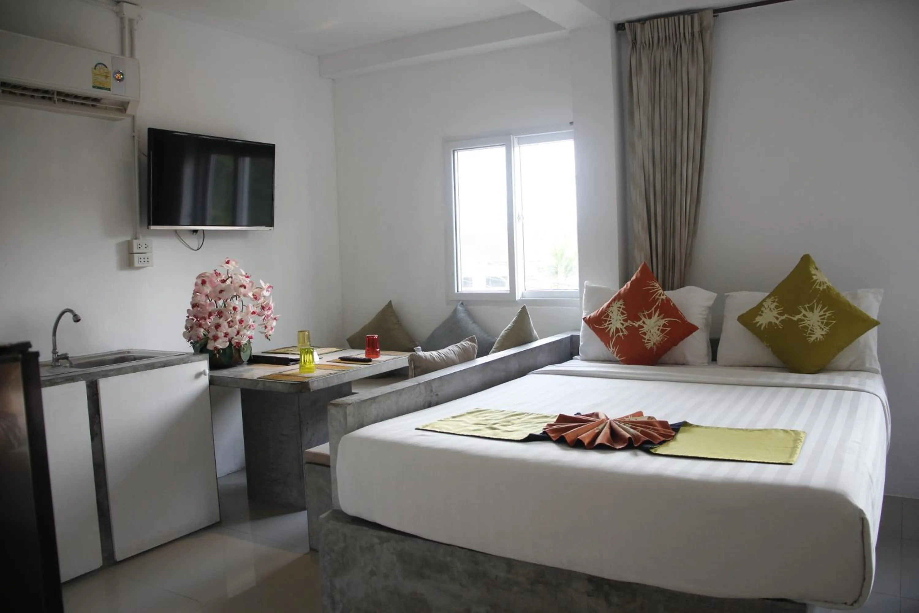 Bed in Samui Beach Residence Hotel