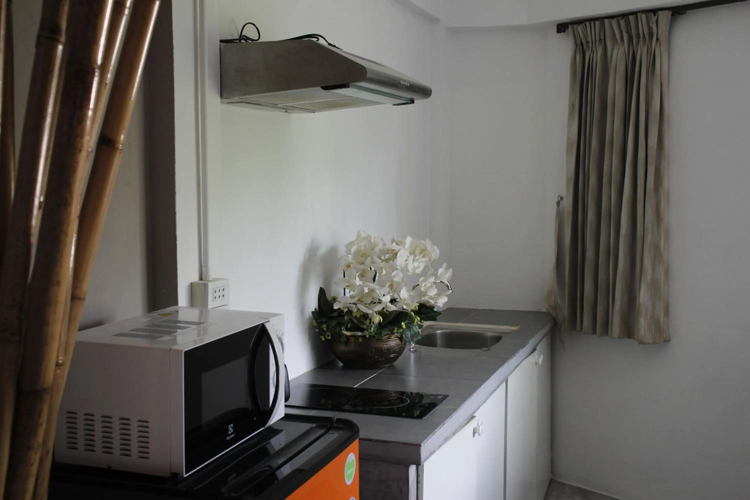 Kitchen or kitchenette in Samui Beach Residence Hotel