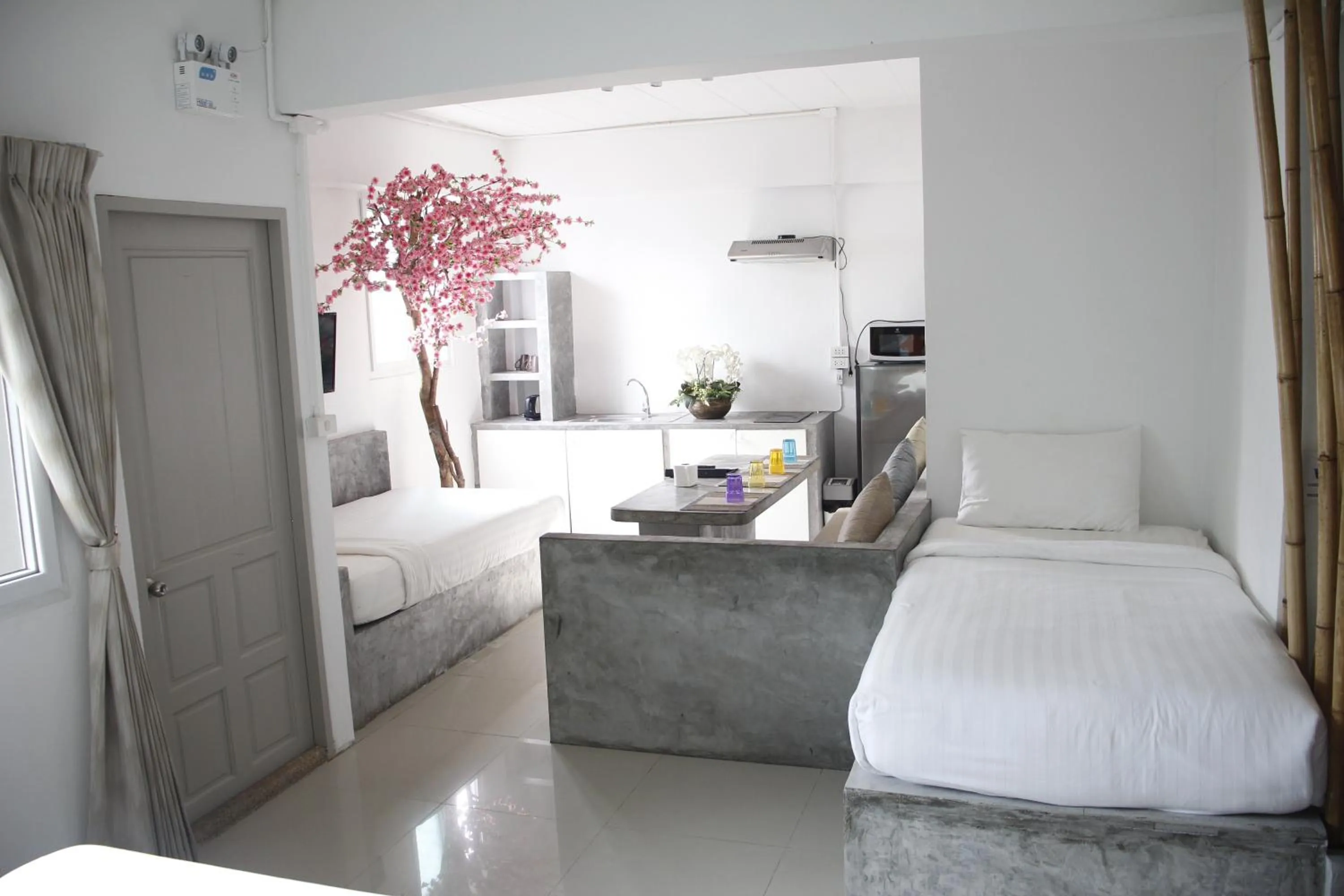 Living room, Bed in Samui Beach Residence Hotel