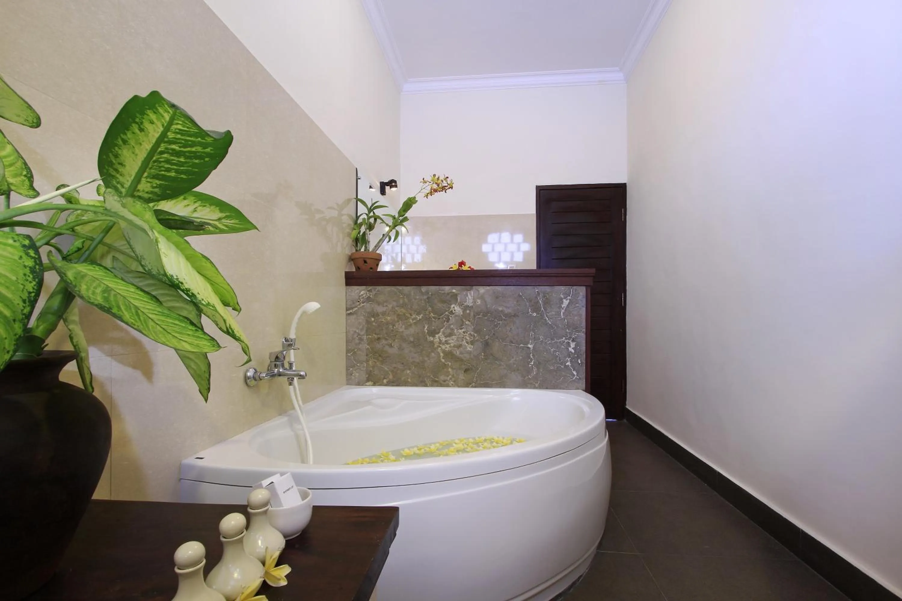 Toilet in Nang Ade Villa by GenuineHost